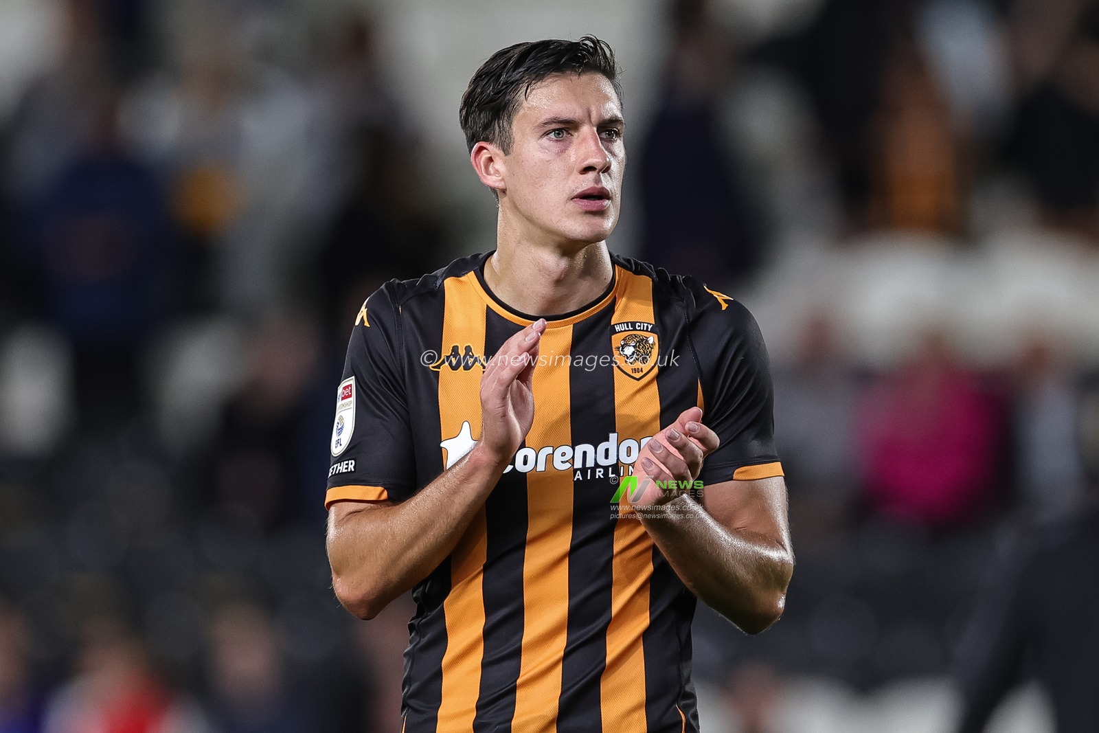 Alfie Jones #5 of Hull City applauds the home fans during the Sky Bet Championship match Hull City vs Bristol City at MKM Stadium, Hull, United Kingdom, 25th August 2023

(Photo by Mark Cosgrove/News Images)