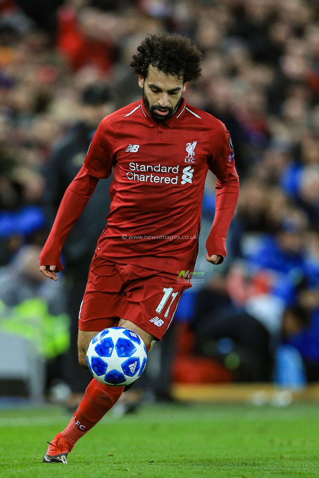 11th December 2018, Anfield, Liverpool, England; UEFA Champions League, Liverpool v Napoli ; Mohamed Salah (11) of Liverpool with the ball 


  Credit: Mark Cosgrove/News Images
