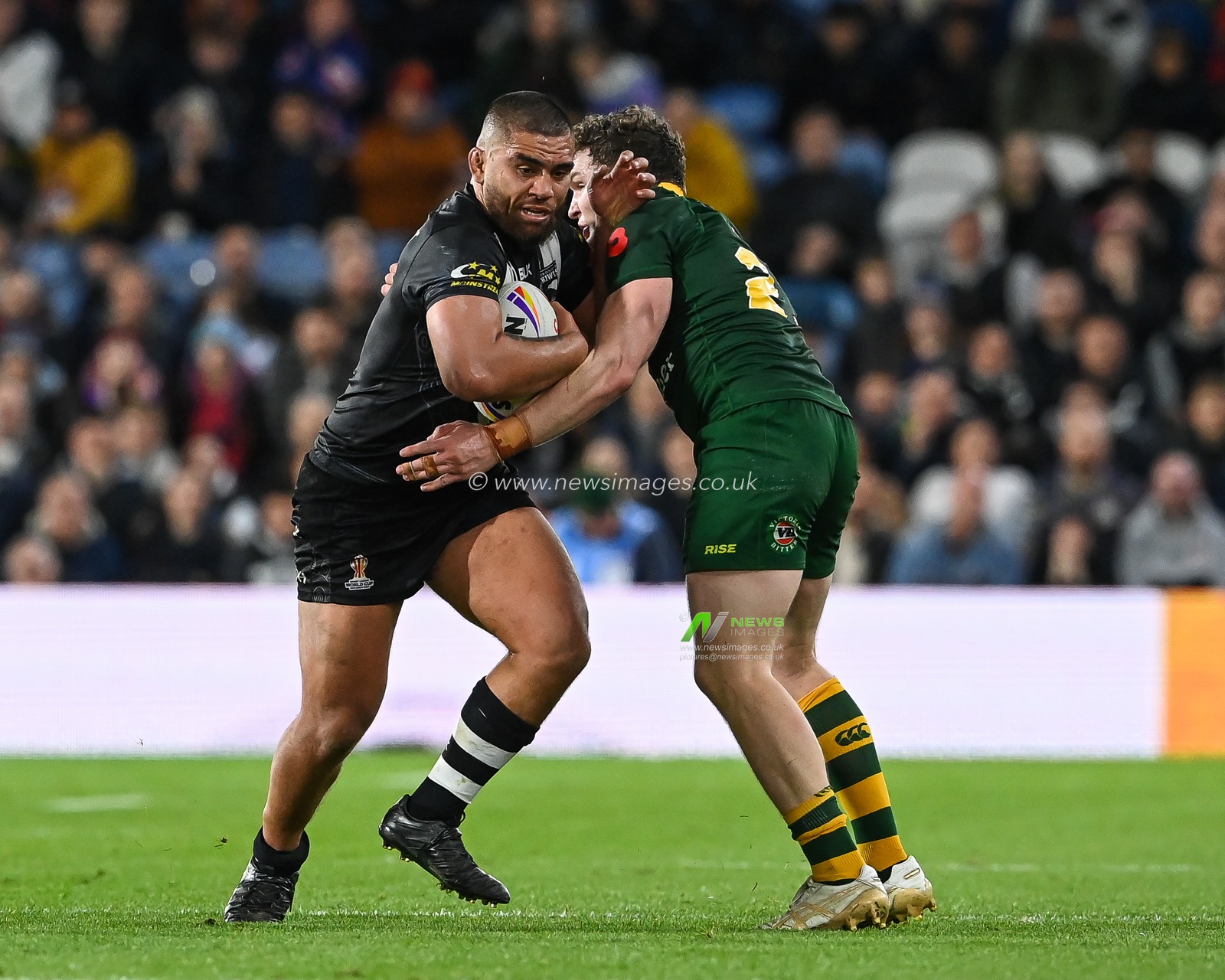 Isaiah Papali'i of New Zealand is tackled by Liam Martin of Australia during the Rugby League World Cup 2021 Semi Final match Australia vs New Zealand at Elland Road, Leeds, United Kingdom, 11th November 2022

(Photo by Craig Thomas/News Images)