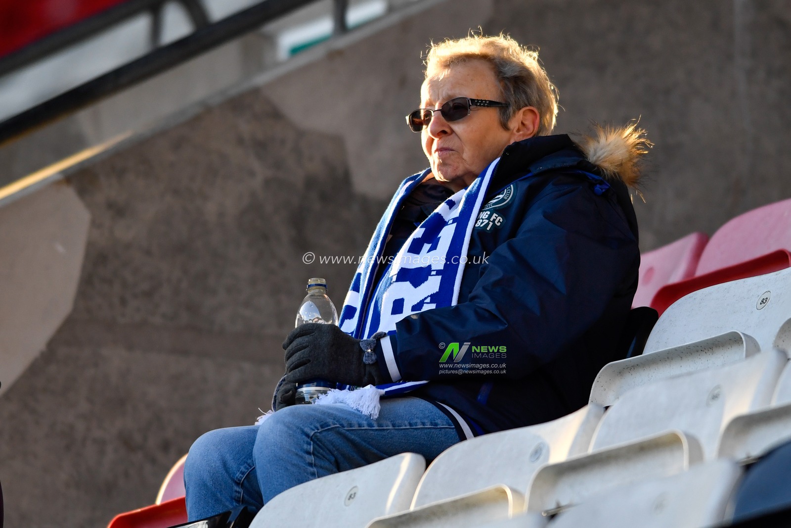 30th November 2019, DW Stadium, Wigan, England; Sky Bet Championship, Wigan Athletic v Reading : A Reading fan takes their seat before the game

Credit: Simon Whitehead/News Images