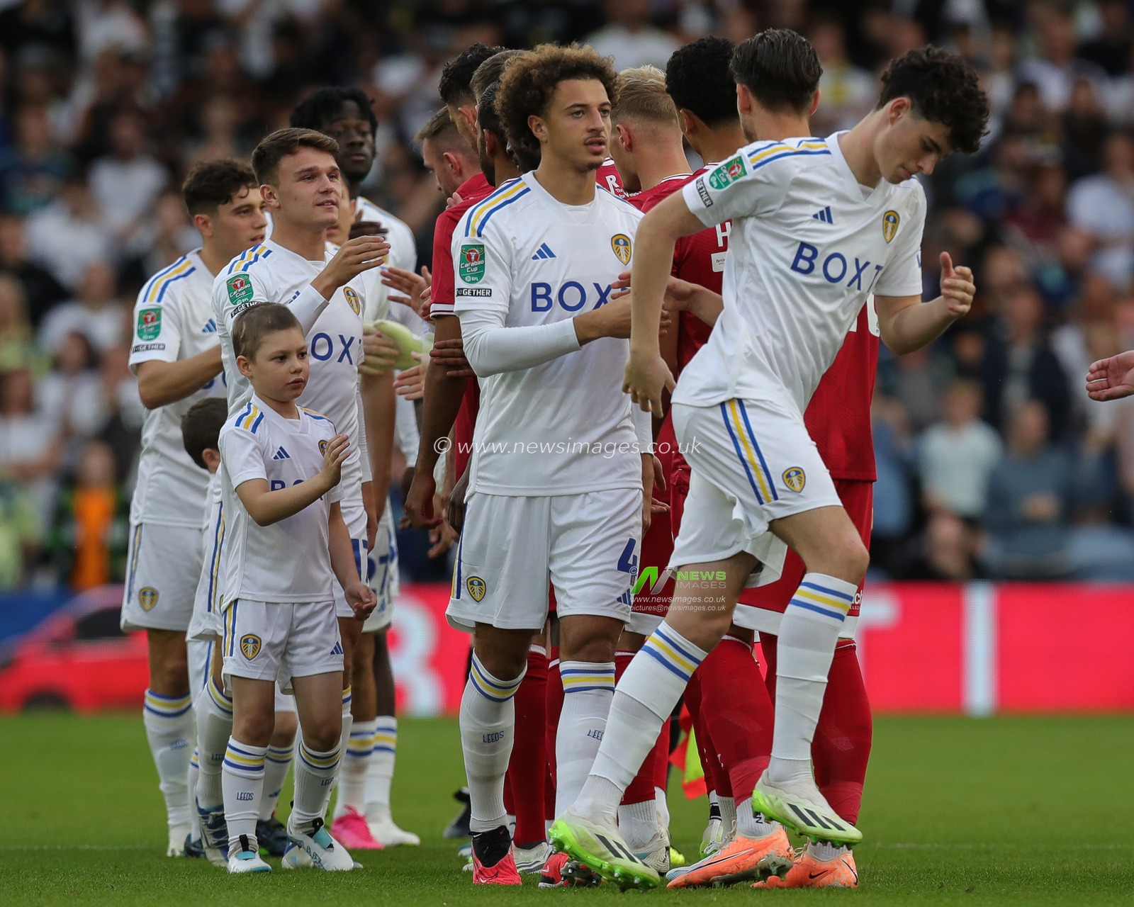 Ethan Ampadu #4 of Leeds United shakes hands with the Shrewsbury players before kick off ahead of the Carabao Cup match Leeds United vs Shrewsbury Town at Elland Road, Leeds, United Kingdom, 9th August 2023

(Photo by James Heaton/News Images)