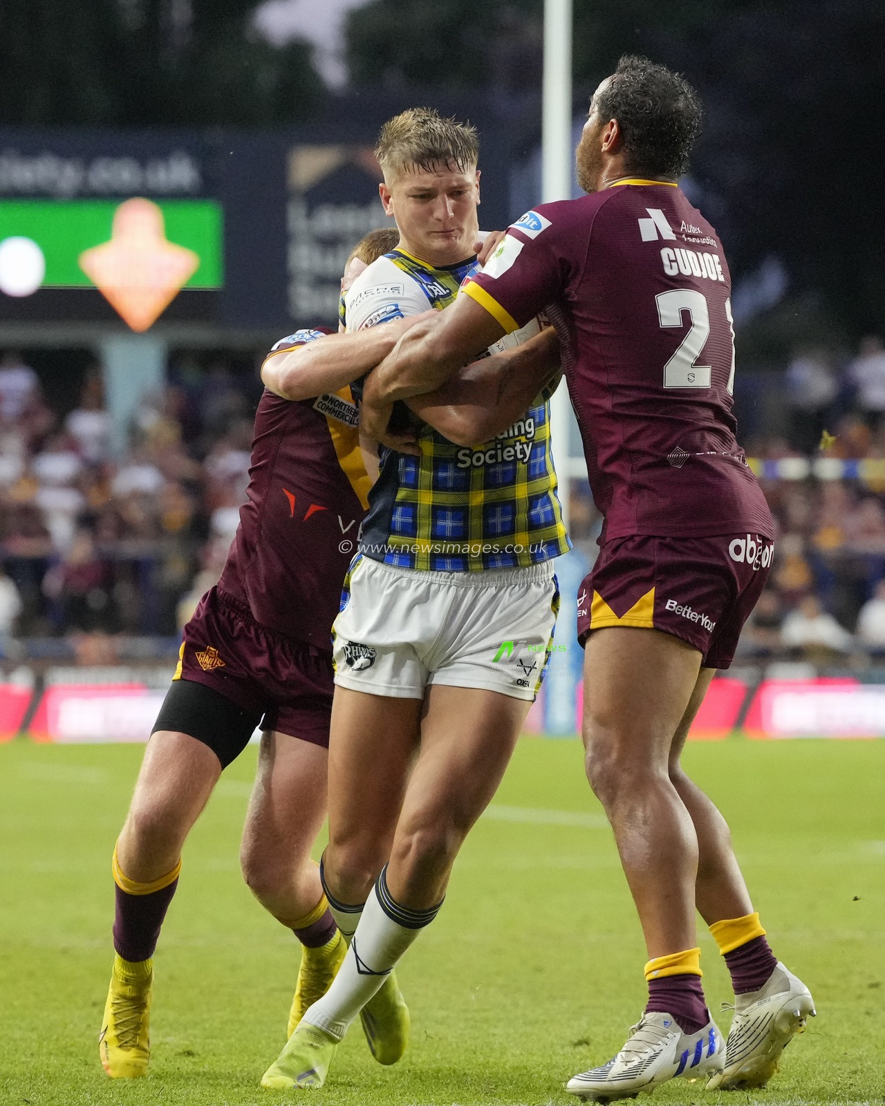 Sam Walters #22 of Leeds Rhinos runs at Leroy Cudjoe #21 of Huddersfield Giants during the Betfred Super League Round 16 match Leeds Rhinos vs Huddersfield Giants at Headingley Stadium, Leeds, United Kingdom, 23rd June 2023

(Photo by Steve Flynn/News Images)