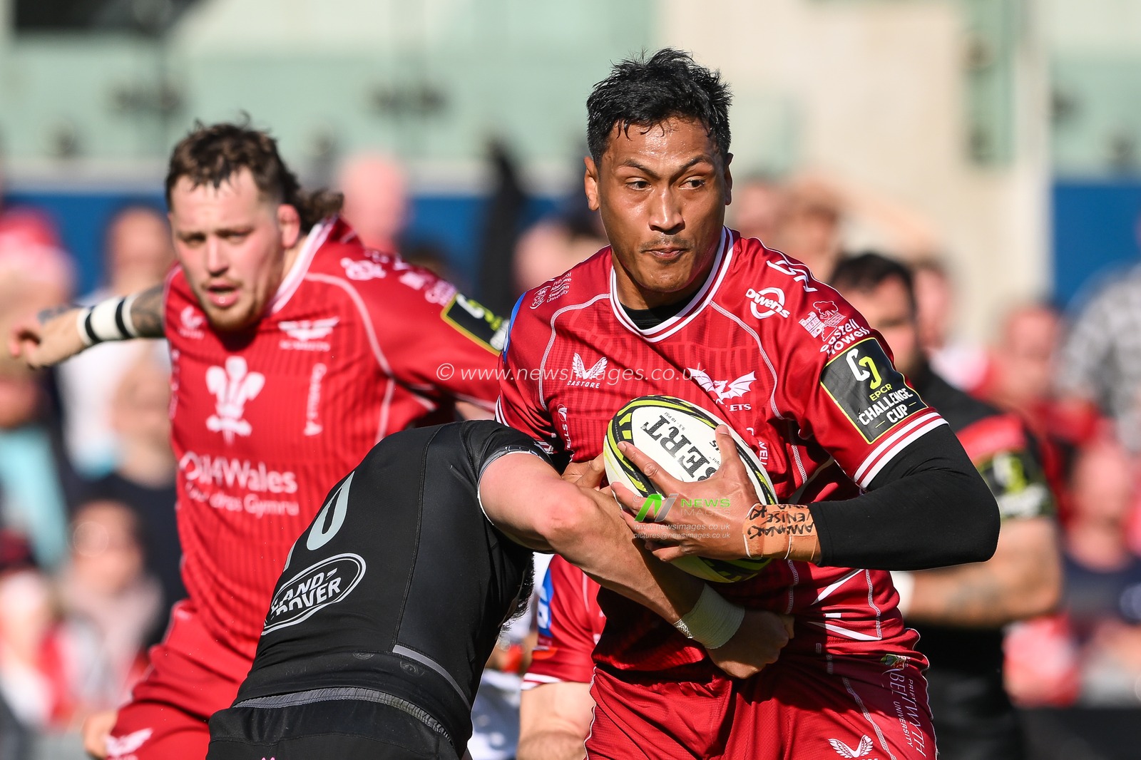 Sam Lousi of Scarlets is tackled by Tom Jordan of Glasgow Warriors during the European Challenge Cup Semi-Final match Llanelli Scarlets vs Glasgow Warriors at Parc y Scarlets, Llanelli, United Kingdom, 29th April 2023

(Photo by Craig Thomas/News Images)