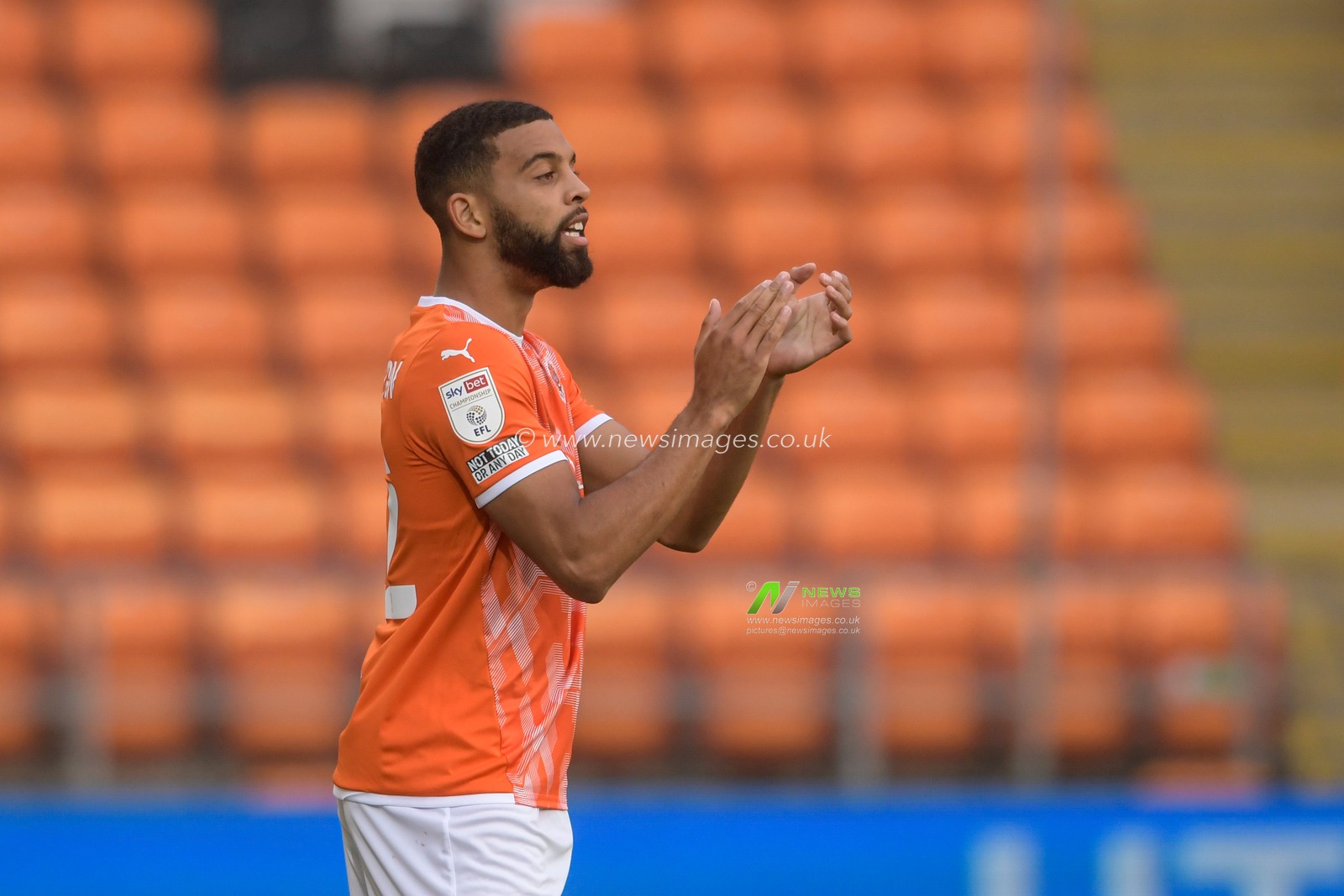 CJ Hamilton #22 of Blackpool encourages his team