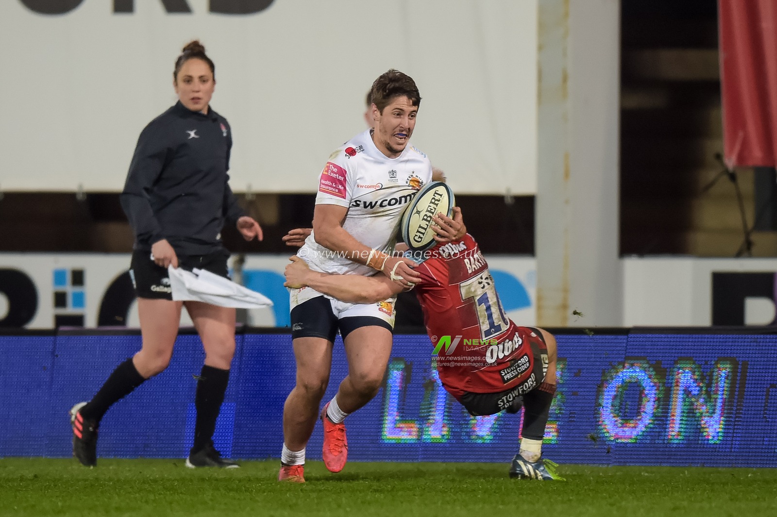 Facundo Cordero # of Exeter Chiefs is tackled by George Barton #10 of Gloucester rugby