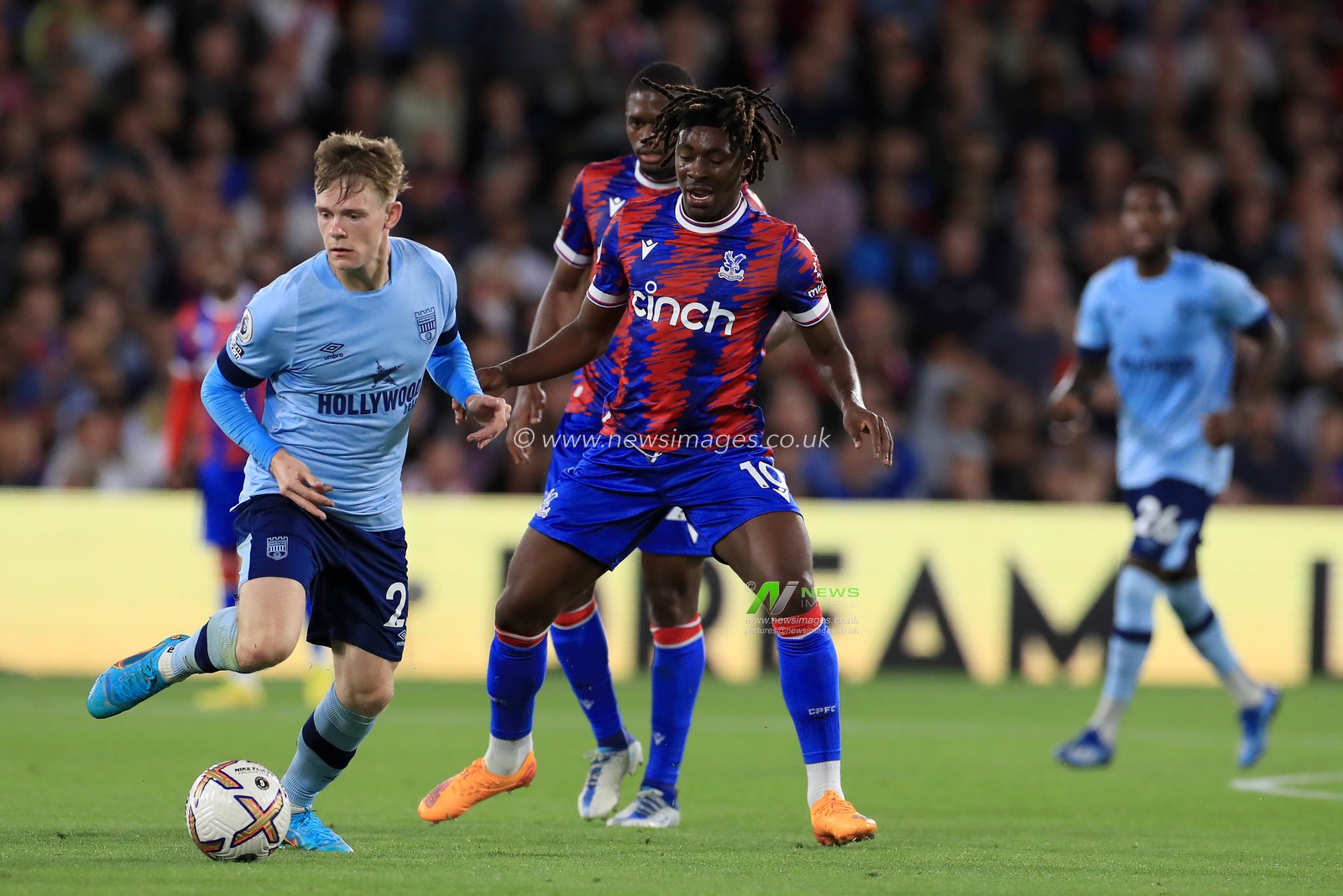 Eberechi Eze #10 of Crystal Palace loses the ball to Keane Lewis-Potter #23 of Brentford