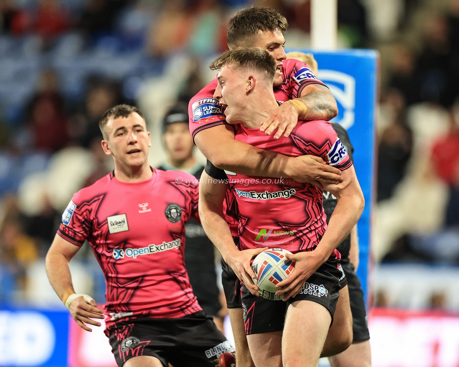Matty Nicholson #30 of Wigan Warriors celebrates his try