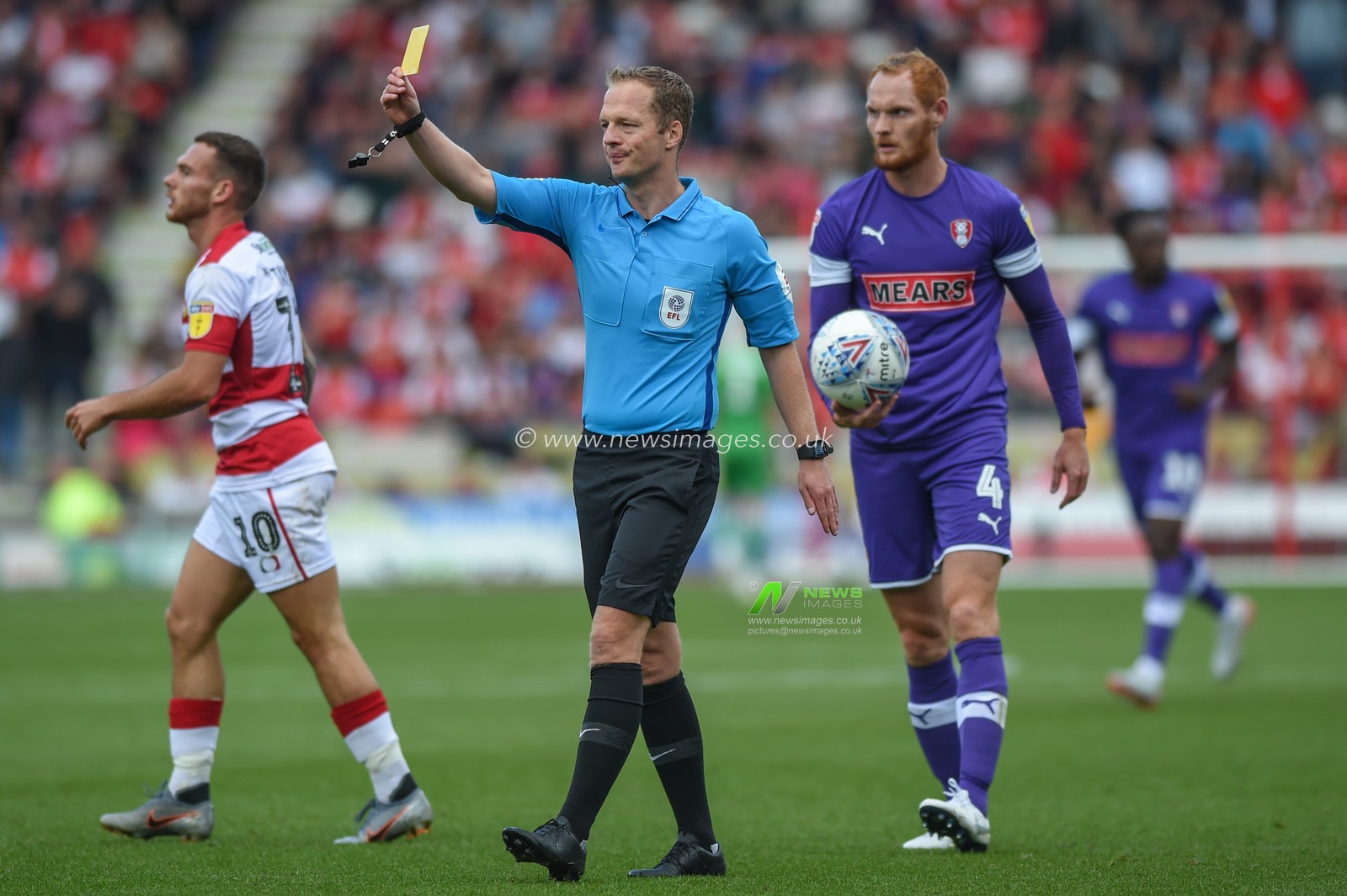 7th September 2019, Keepmoat Stadium, Doncaster, England; Sky Bet League One Football, Doncaster Rovers vs Rotherham United ; Referee Martin Coy issues a yellow card to Matthew Olosunde (22) of Rotherham United.

Credit: Dean Williams/News Images

English Football League images are subject to DataCo Licence