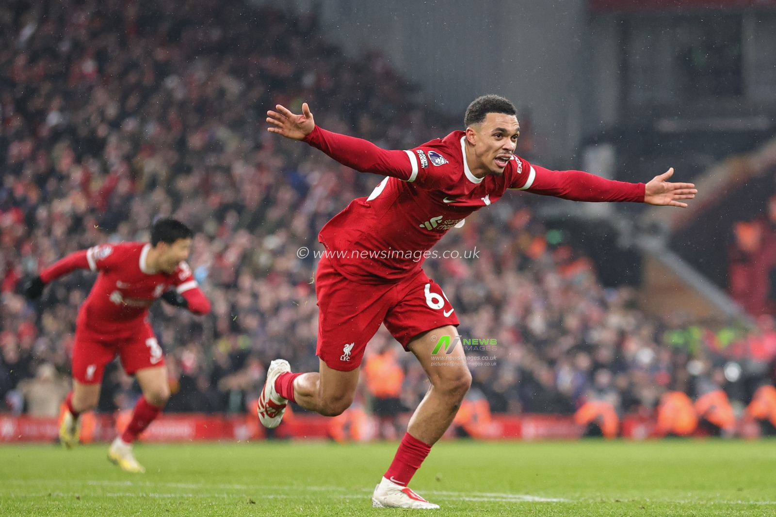 Trent Alexander-Arnold #66 of Liverpool celebrates his goal to make it 4-3 during the Premier League match Liverpool vs Fulham at Anfield, Liverpool, United Kingdom, 3rd December 2023

(Photo by Mark Cosgrove/News Images)