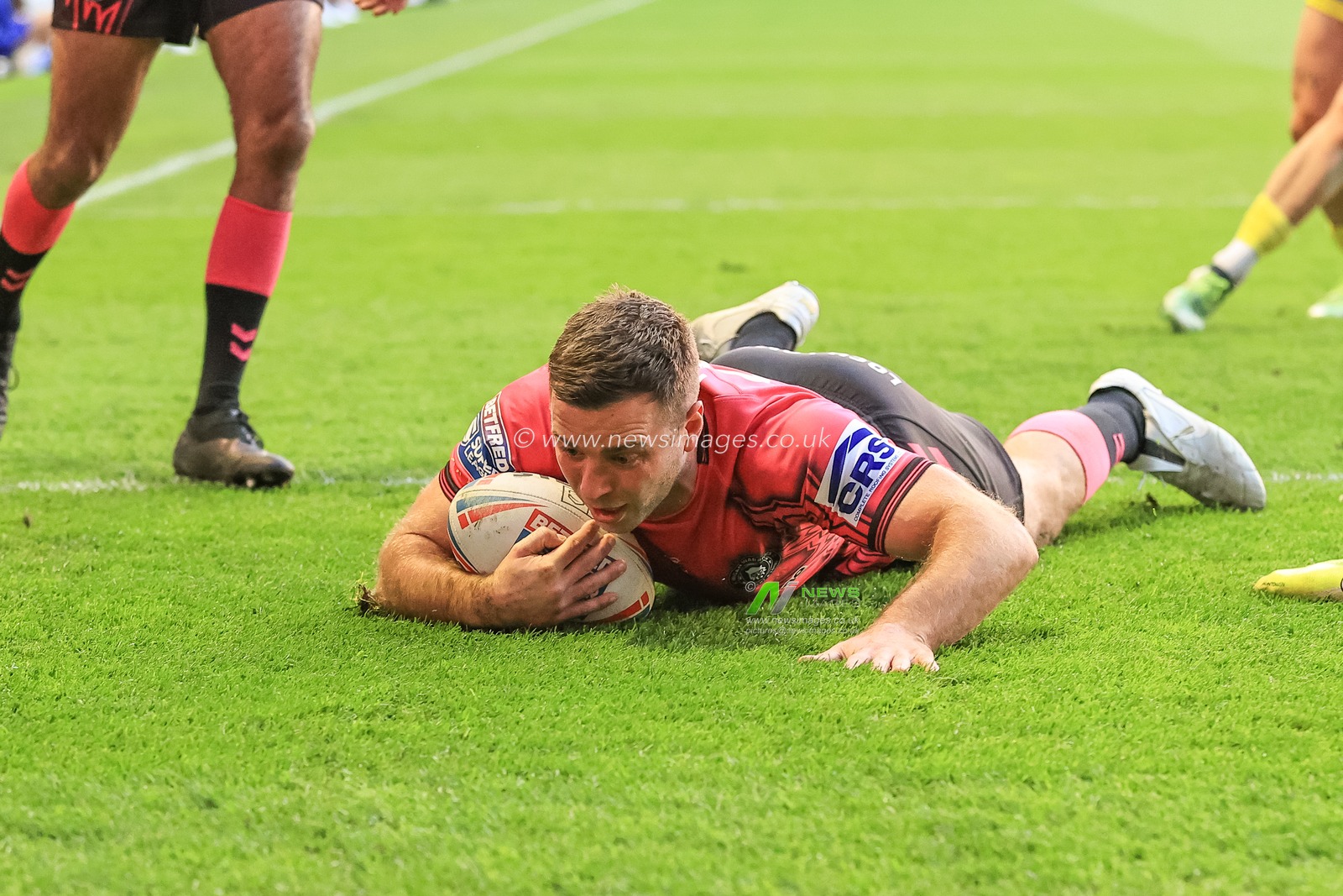Iain Thornley #4 of Wigan Warriors goes over for a second try