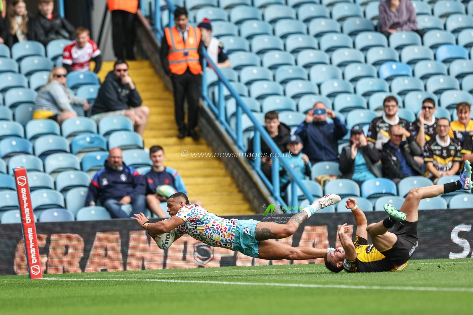 Umyla Hanley of Leigh Leopards goes over for a try during the Magic Weekend match Leigh Leopards vs Salford Red Devils at Elland Road, Leeds, United Kingdom, 18th August 2024

(Photo by Mark Cosgrove/News Images)