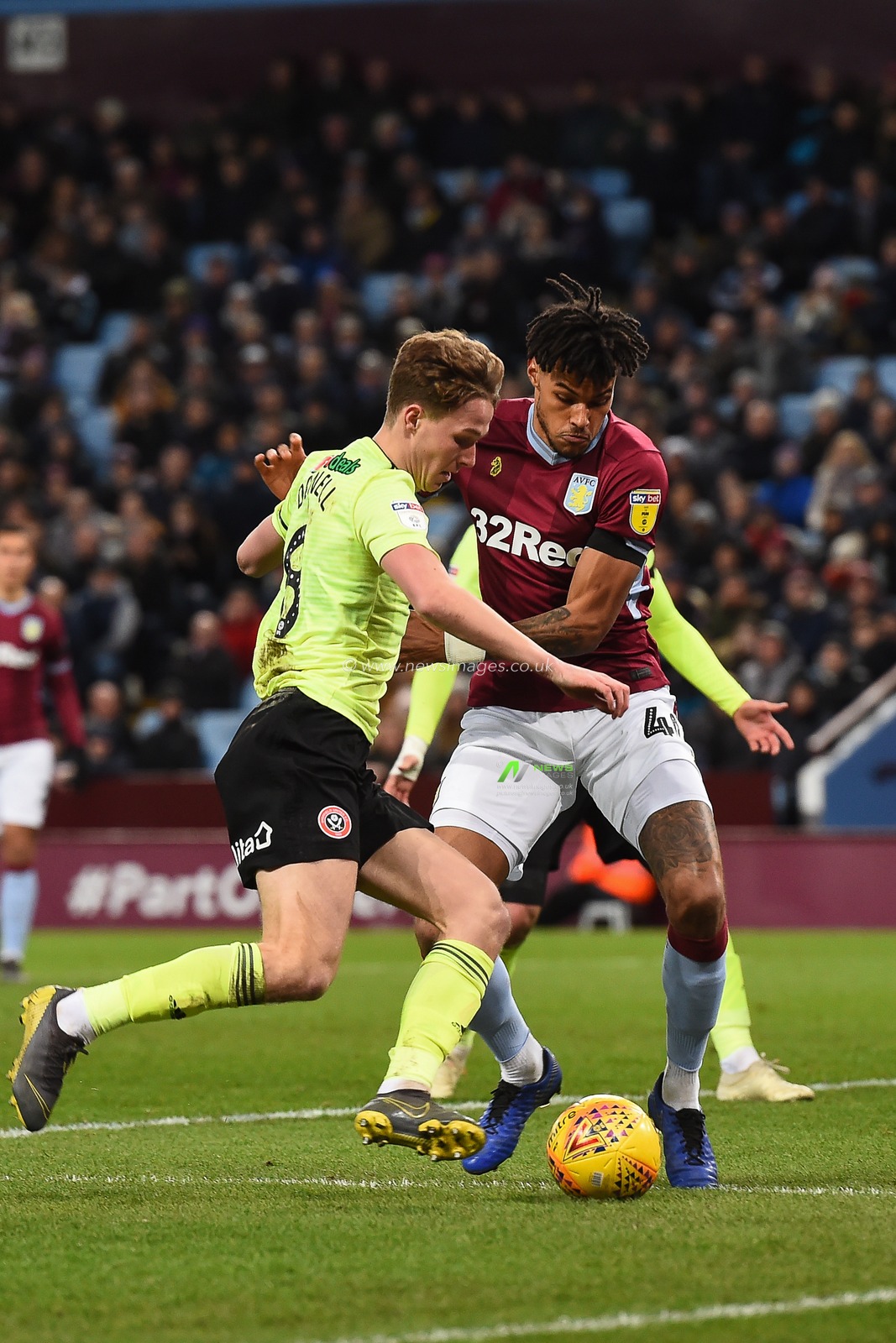 8th February 2019, Villa Park, Birmingham, England ; Sky Bet Championship, Aston Villa v Sheffield United : Kieran Dowell (8) of Sheffield United battles with Tyrone Mings (40) of Aston Villa 

Credit: Jon Hobley/News Images

English Football League images are subject to DataCo Licence