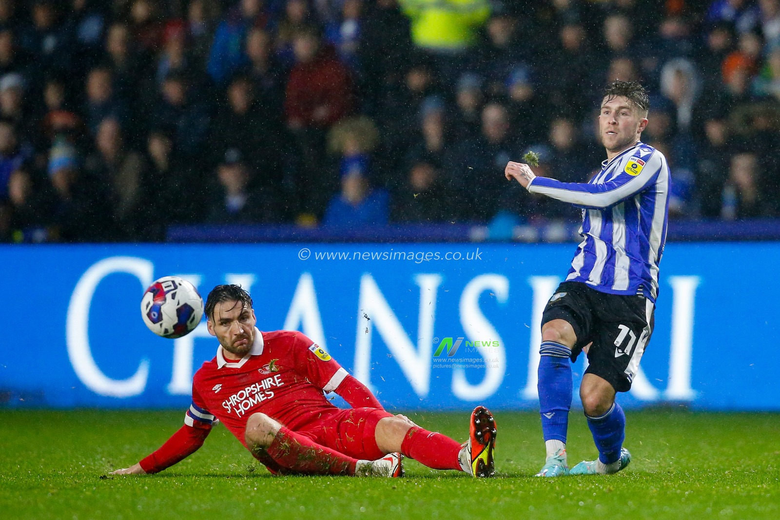 Josh Windass #11 of Sheffield Wednesday and Luke Leahy #3 of Shrewsbury Town during the Sky Bet League 1 match Sheffield Wednesday vs Shrewsbury Town at Hillsborough, Sheffield, United Kingdom, 19th November 2022

(Photo by Ben Early/News Images)