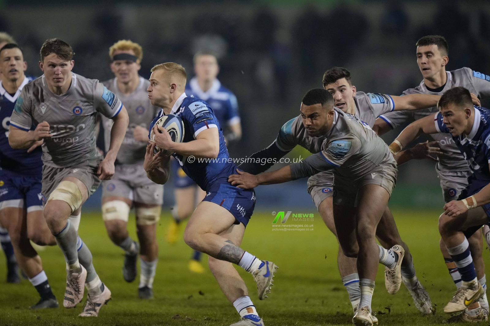 Aaron Reed #23 of Sale Sharks breaks past Max Ojomoh #12 of Bath Rugby during the Gallagher Premiership match Sale Sharks vs Bath Rugby at AJ Bell Stadium, Eccles, United Kingdom, 27th January 2023

(Photo by Steve Flynn/News Images)