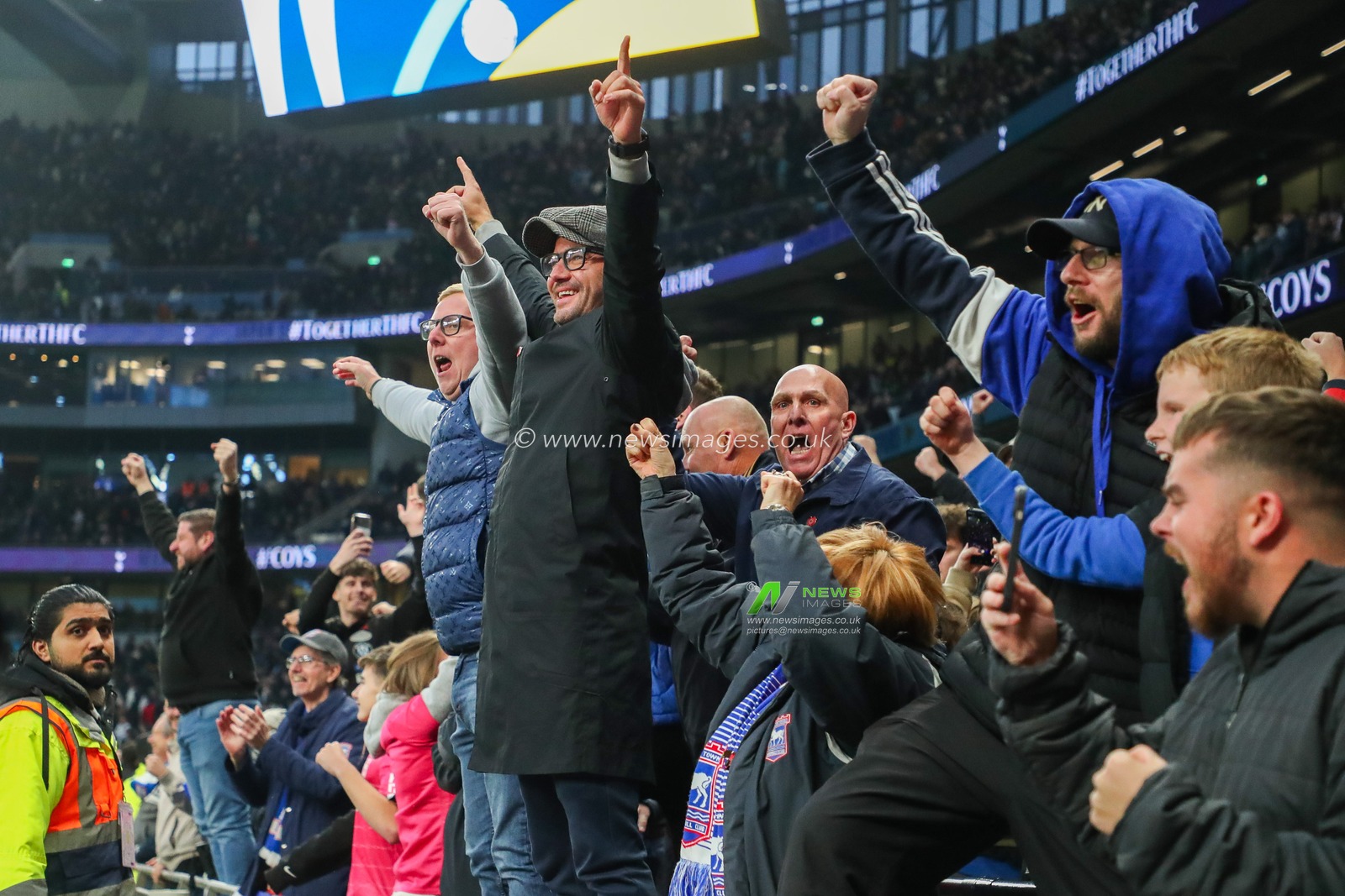 Ipswich Town fans celebrate after the teams first premier league win this season following the Premier League match Tottenham Hotspur vs Ipswich Town at Tottenham Hotspur Stadium, London, United Kingdom, 10th November 2024

(Photo by Izzy Poles/News Images)