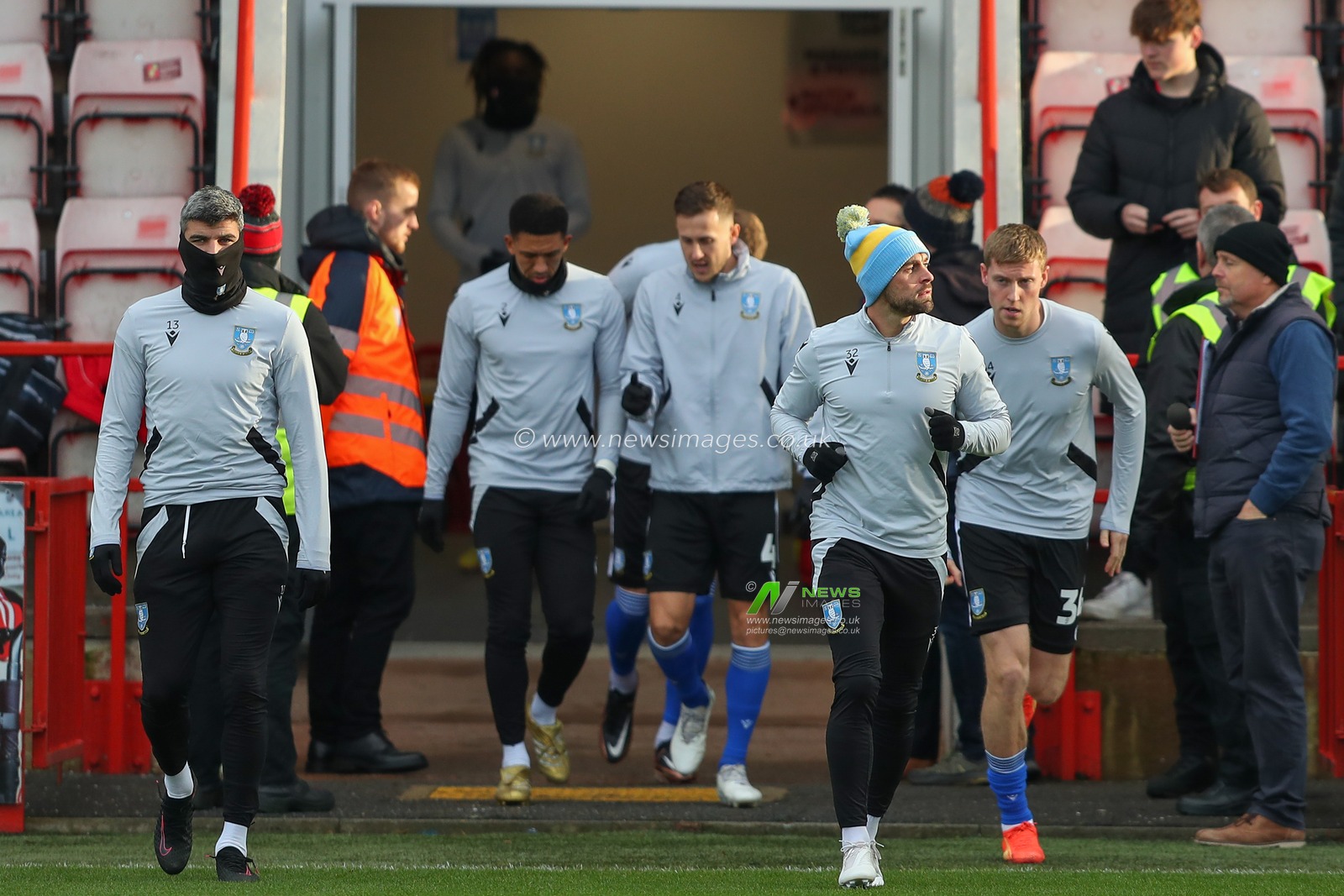 Sheffield Wednesday players come out the tunnel for the pre game warm up ahead of the Sky Bet League 1 match Exeter City vs Sheffield Wednesday at St James' Park, Exeter, United Kingdom, 10th December 2022

(Photo by Gareth Evans/News Images)