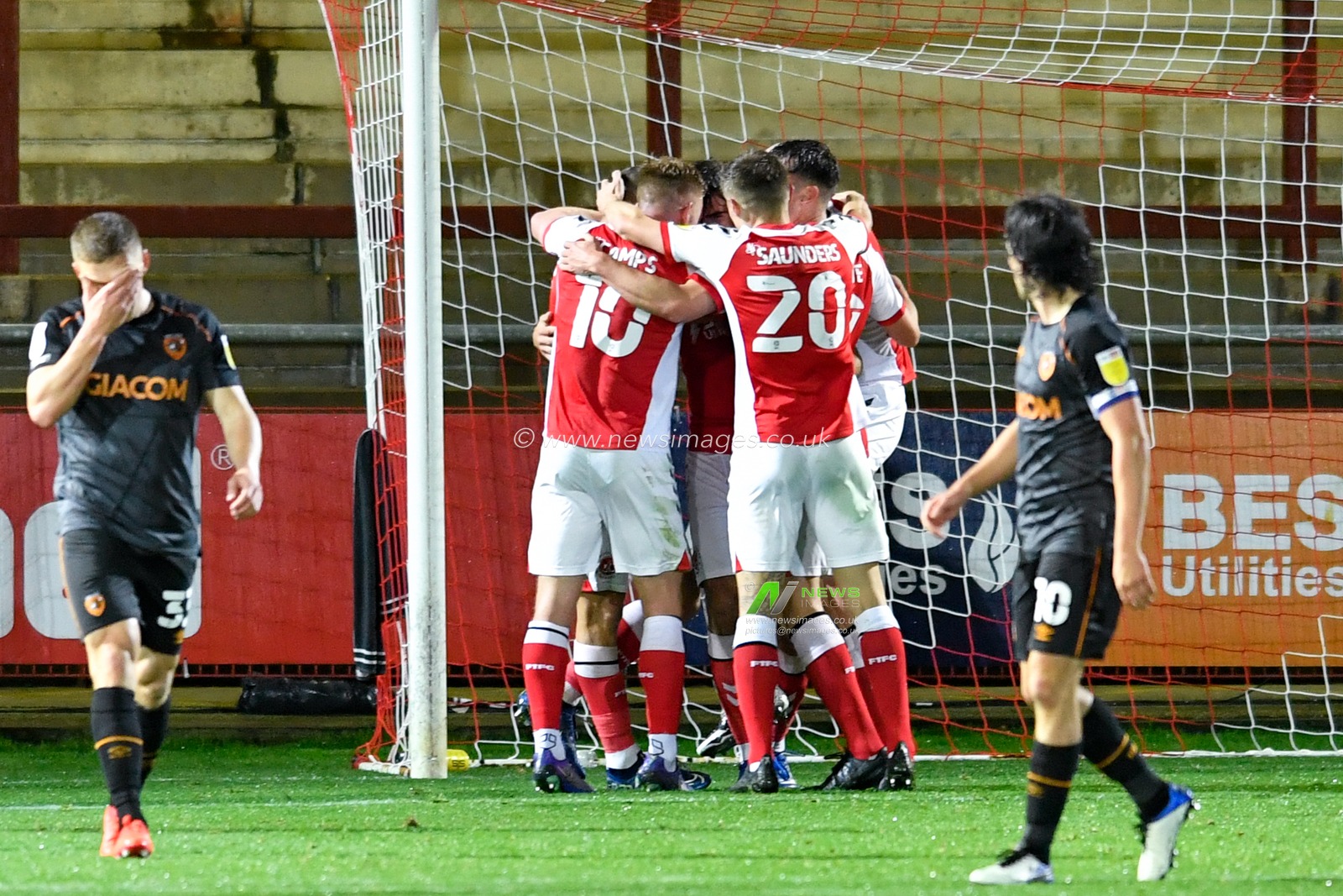 The Fleetwood Town players celebrate taking a 4 -1 lead