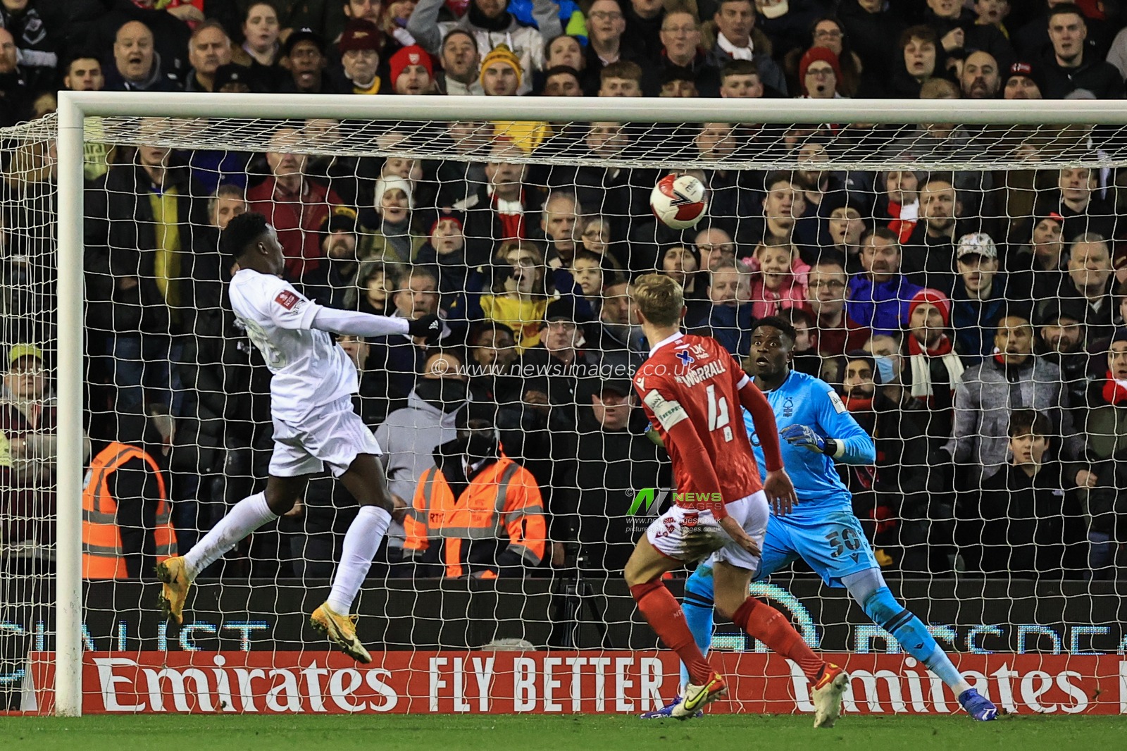 Eddie Nketiah #30 of Arsenal heads just wide of the post