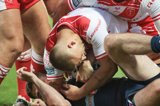 Jack Welsby of St. Helens is tackled by Mikey Lewis of Hull KR during the Betfred Super League Round 24 match Hull KR vs St Helens at Sewell Group Craven Park, Kingston upon Hull, United Kingdom, 29th August 2025

(Photo by Mark Cosgrove/News Images)