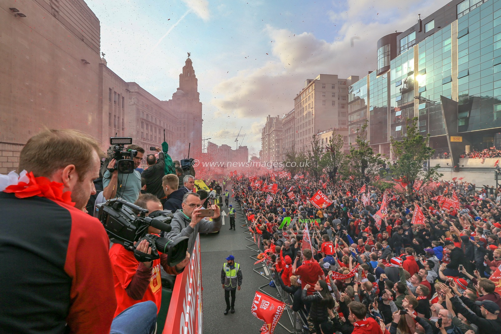 2nd June 2019 , Liverpool, England; UEFA Champions League, Liverpool FC Champions League winners celebrations and open top bus parade ; Liverpool fans line the streets to welcome home their heroes after winning the European Cup for the sixth time 

Credit: Mark Cosgrove/News Images