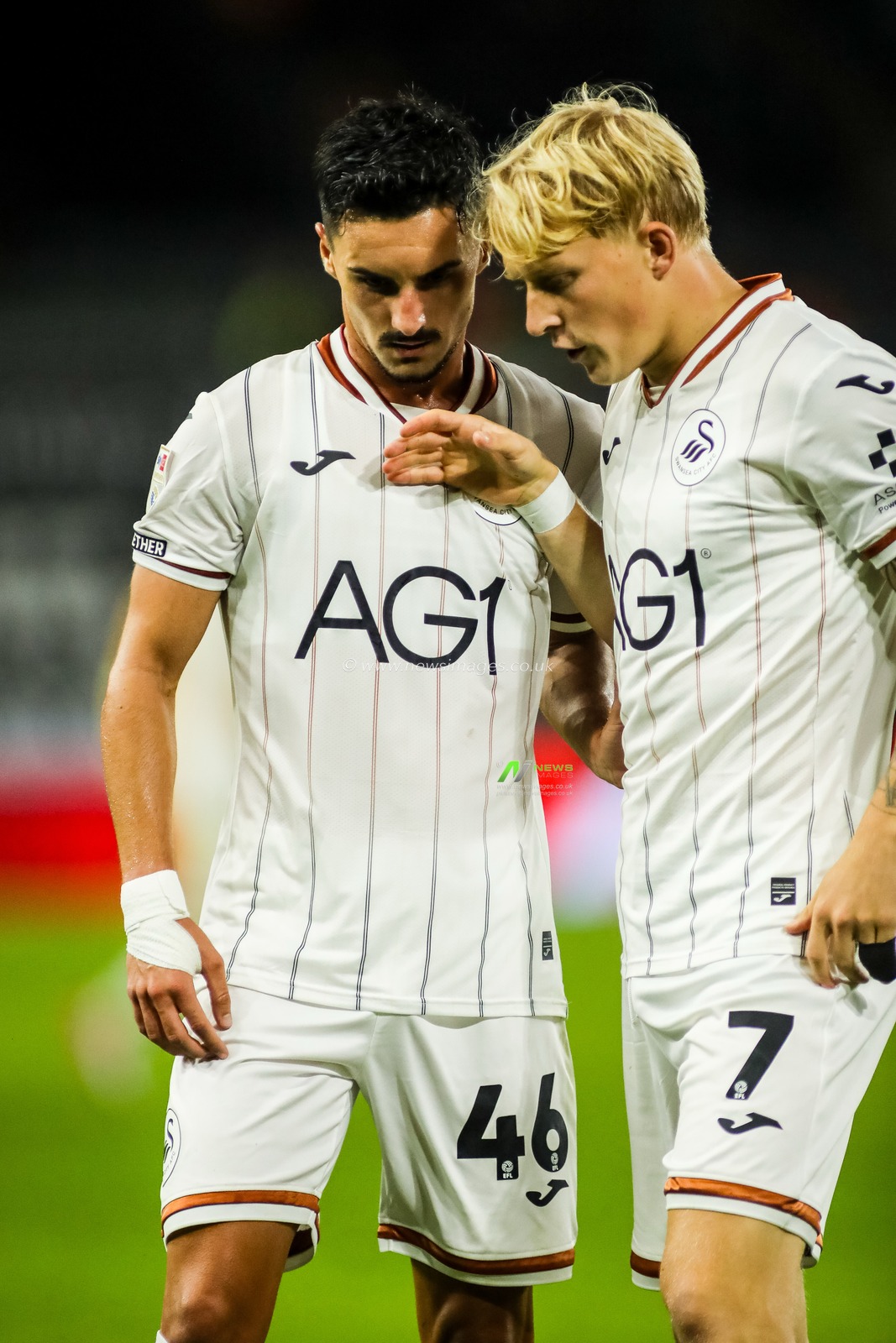 Stephen Eustaquio and Melker Widell of Swansea City talk to eachother during the Sky Bet Championship match Swansea City vs Watford at Swansea.com Stadium, Swansea, United Kingdom on 01 September 2026

(Photo by Andrew Lewis/News Images)