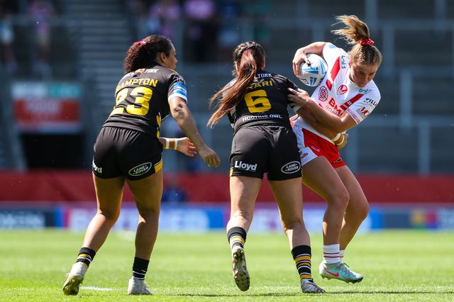 Erin Scott of St Helens is tackled during the Betfred Women's Challenge Cup Semi-final match St Helens vs York City Knights at Totally Wicked Stadium, St Helens, United Kingdom, 11th May 2025

(Photo by Gareth Evans/News Images)