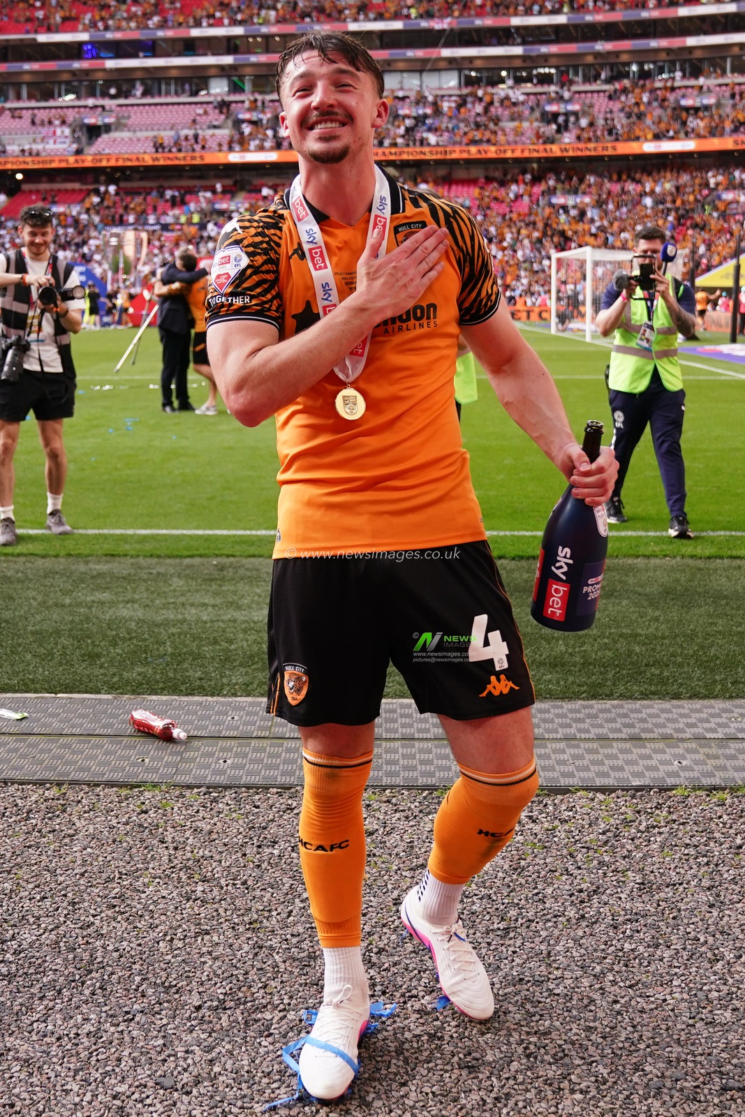 Charlie Hughes of Hull City celebrates promotion during the Sky Bet Championship Playoffs Final match Hull City vs Middlesbrough at Wembley Stadium, London, United Kingdom on 23 May 2026

(Photo by Harvey Murphy/News Images)