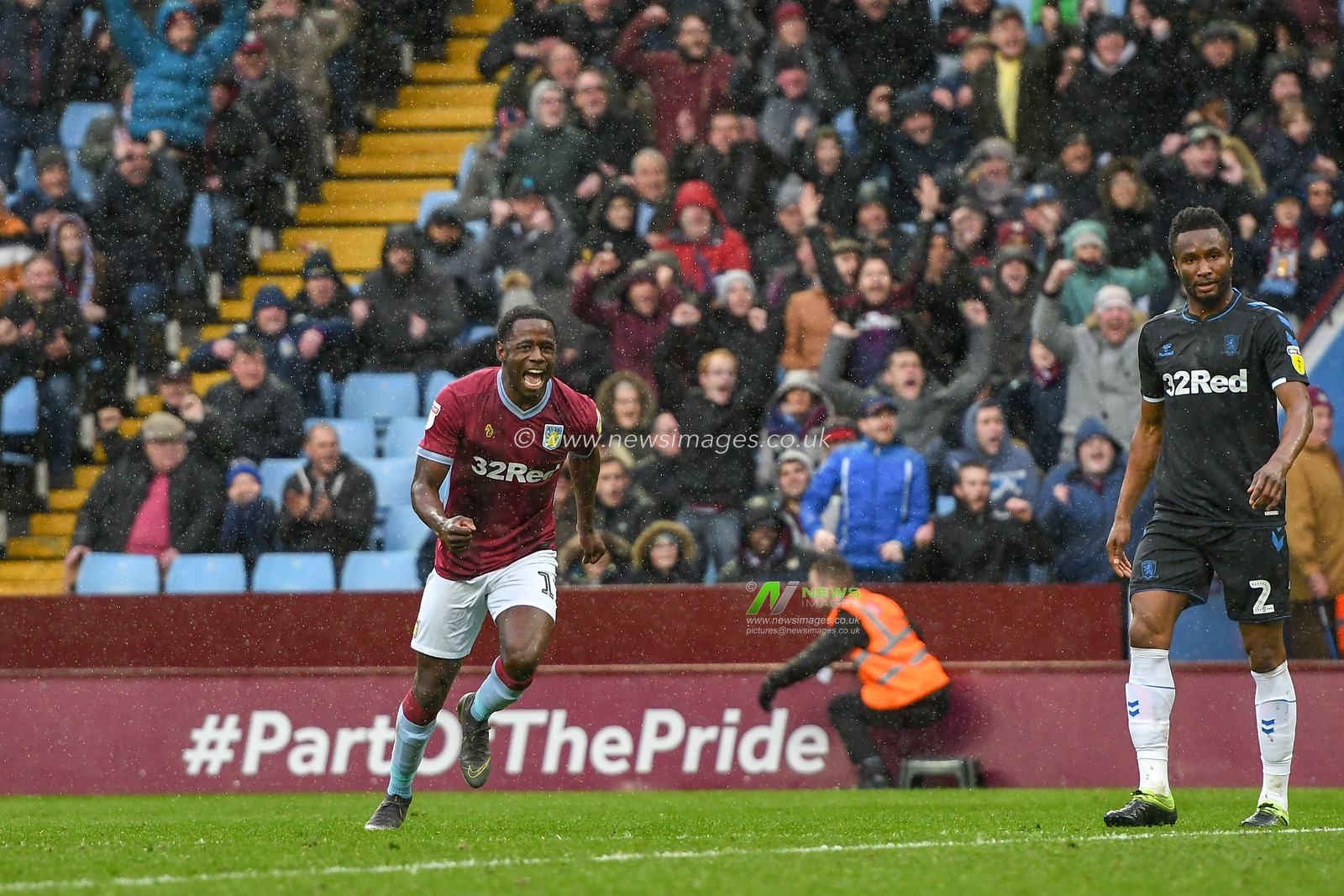 16th March 2019, Villa Park, Birmingham, England ; Sky Bet Championship, Aston Villa v Middlesbrough : Keinan Davis (17) of Aston Villa celebrates Albert Adomah (37) of Aston Villa goal

Credit: Gareth Dalley/News Images

English Football League images are subject to DataCo Licence
