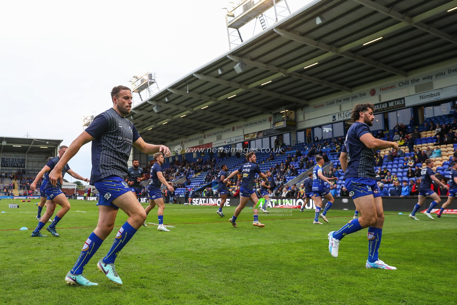 Warrington Wolves players during the pre-game warm up ahead of the Betfred Super League Round 16 match Warrington Wolves vs Huddersfield Giants at Halliwell Jones Stadium, Warrington, United Kingdom, 5th July 2024

(Photo by Gareth Evans/News Images)