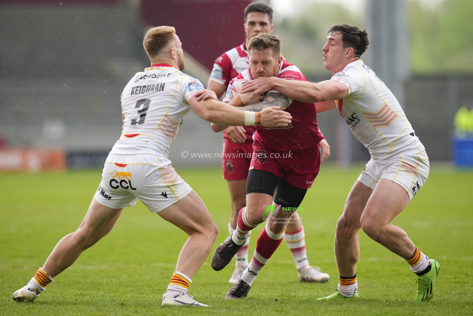 Marc Sneyd #7 of Salford Red Devils is tackled by Adam Keighran #3 of Catalans Dragons during the Betfred Super League Round 10 match Salford Red Devils vs Catalans Dragons at AJ Bell Stadium, Eccles, United Kingdom, 23rd April 2023

(Photo by Steve Flynn/News Images)