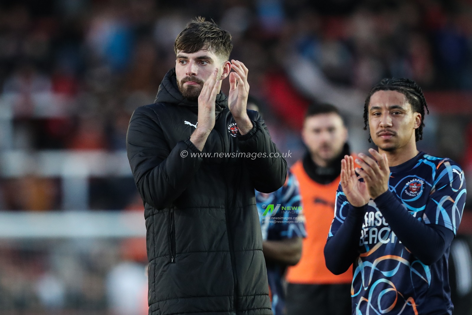 Tom Bloxham of Blackpool applauds the travelling fans after the Sky Bet League 1 match Exeter City vs Blackpool at St James' Park, Exeter, United Kingdom, 25th January 2025

(Photo by Gareth Evans/News Images)