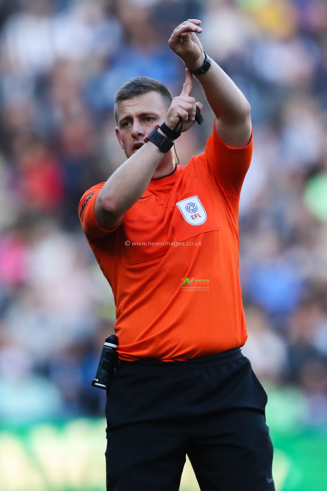 Referee Josh Smith signals to his watch during the Sky Bet Championship match West Bromwich Albion vs Cardiff City at The Hawthorns, West Bromwich, United Kingdom, 26th October 2024

(Photo by Gareth Evans/News Images)