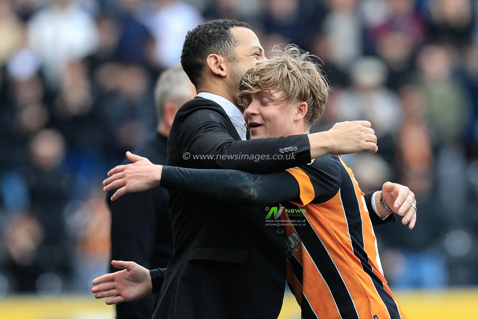 Liam Rosenior manager of Hull City hugs Harry Vaughan as he comes off in the second half of the Sky Bet Championship match Hull City vs Watford at MKM Stadium, Hull, United Kingdom, 22nd April 2023

(Photo by James Heaton/News Images)