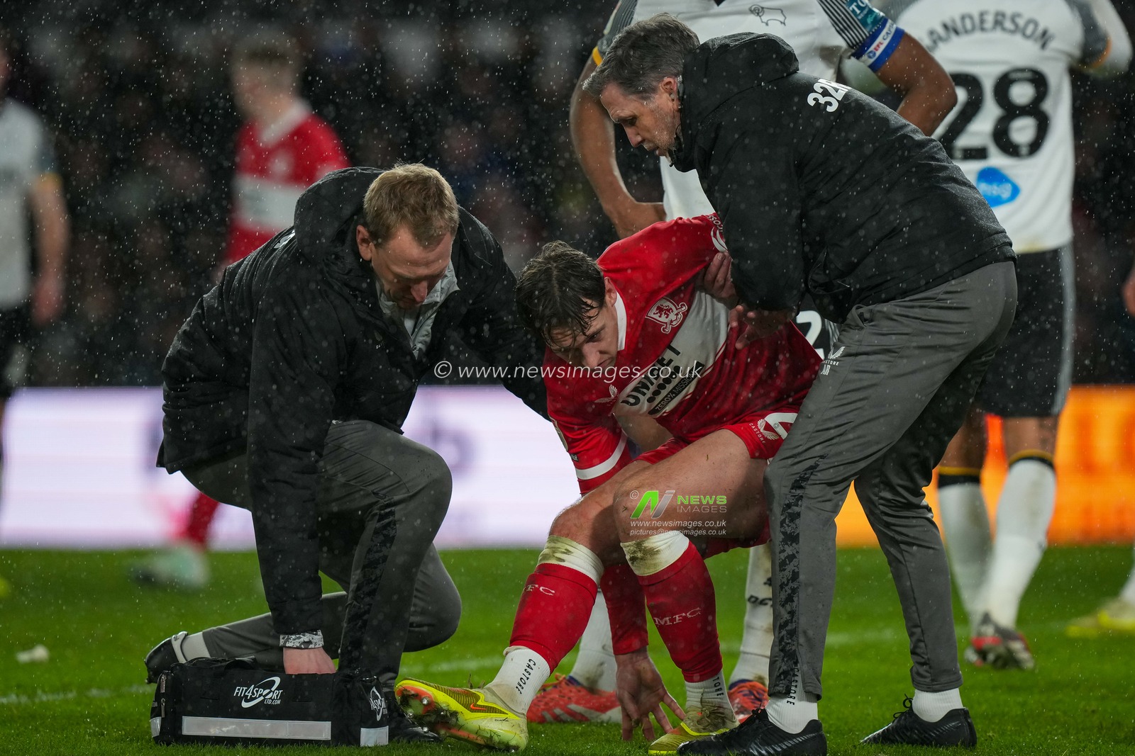 Callum Brittain of Middlesbrough is helped off the field after suffering an injury during the Sky Bet Championship match Derby County vs Middlesbrough at Pride Park Stadium, Derby, United Kingdom, 1st January 2026

(Photo by Maynard Manyowa/News Images)

*** GER AUT SUI OUT ***
