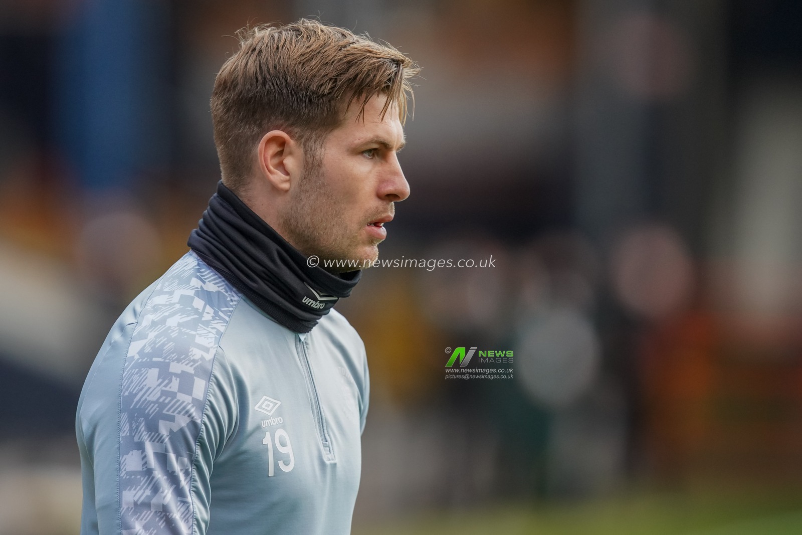 James Collins #19 of Luton Town warming up