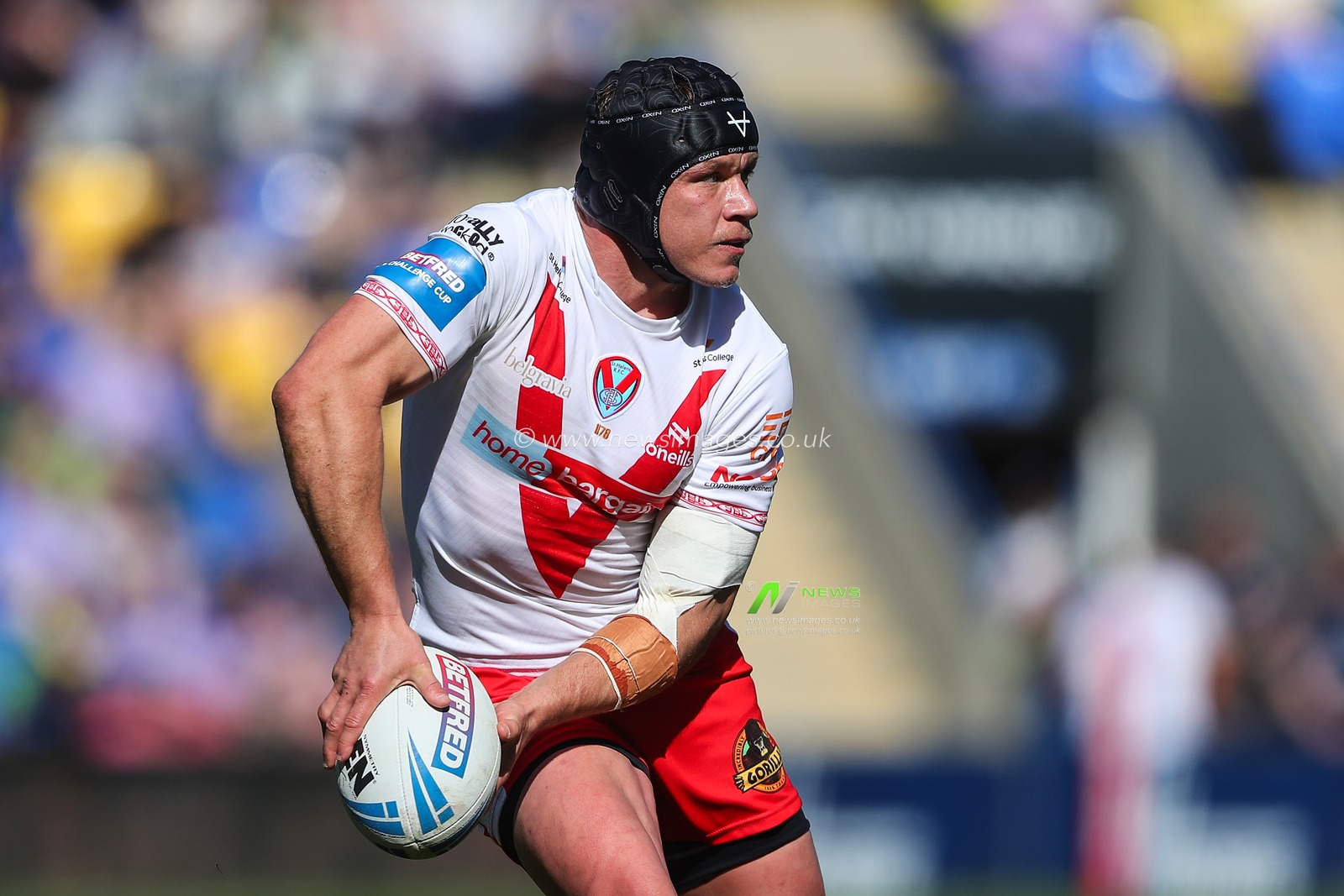 Jonny Lomax of St. Helens in action during the Betfred Challenge Cup Quarter Final match Warrington Wolves vs St Helens at Halliwell Jones Stadium, Warrington, United Kingdom, 5th April 2025

(Photo by Gareth Evans/News Images)