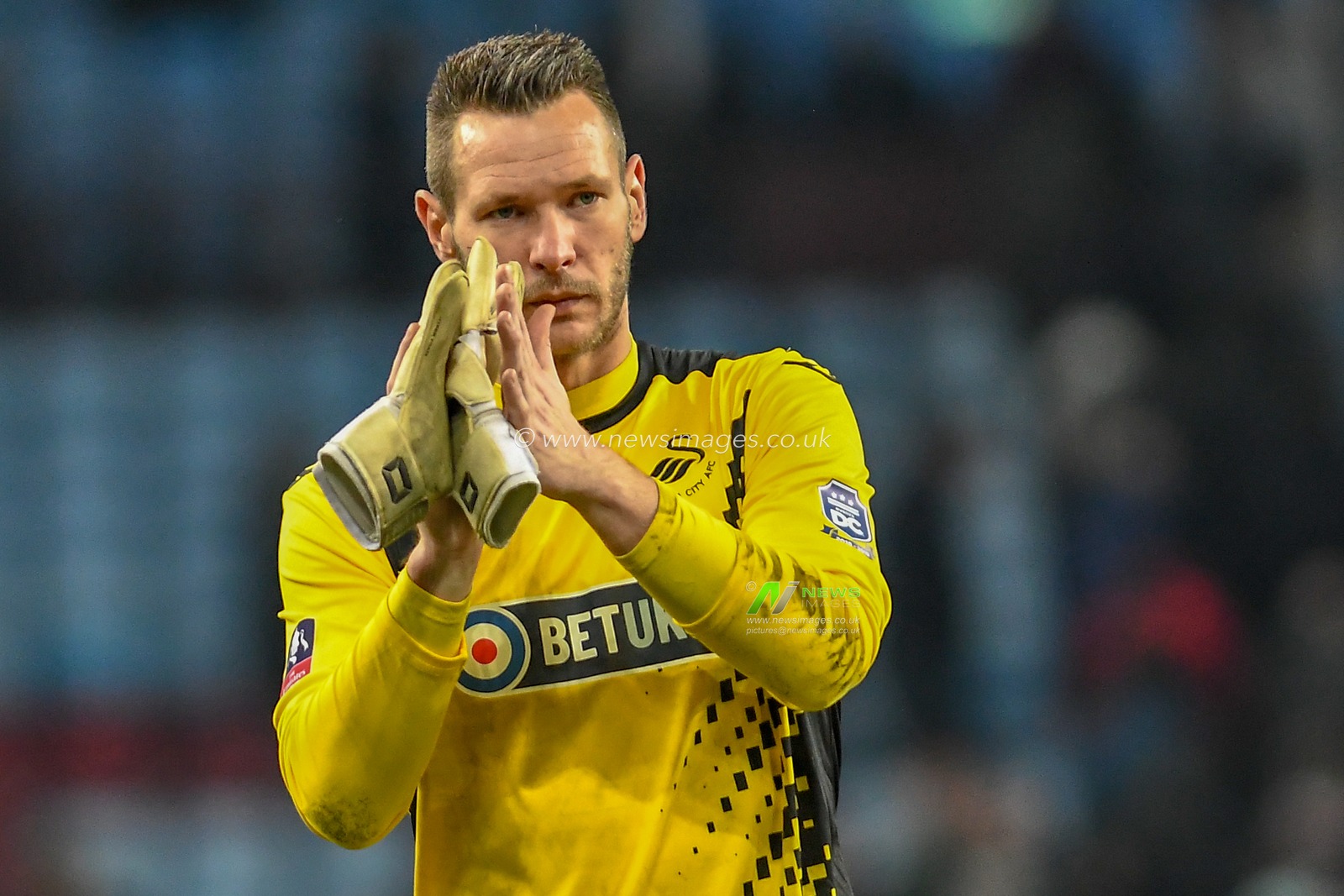 5th January 2019, Villa Park, Birmingham, England ; The Emirates FA Cup, 3rd Round, Aston Villa vs Swansea City : Erwin Mulder (25) of Swansea City celebrating after the final whistle

Credit: Gareth Dalley/News Images

English Football League images are subject to DataCo Licence
