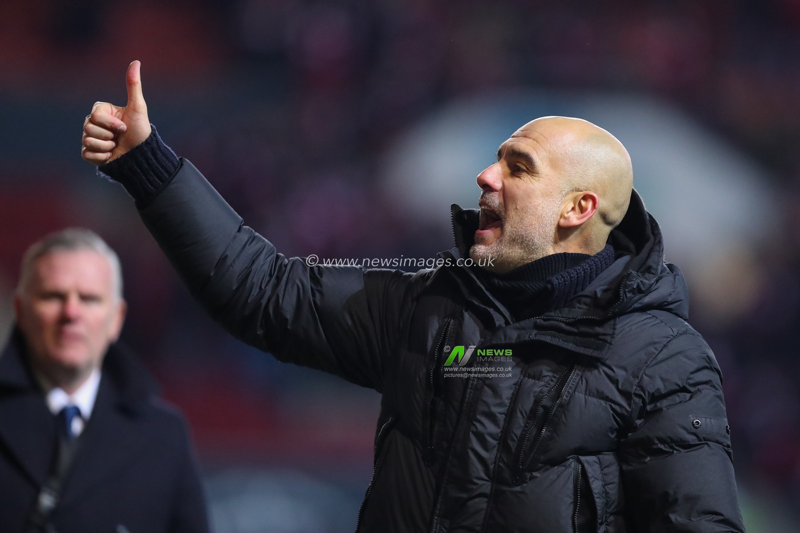 Pep Guardiola manager of Manchester City celebrates his teams win with the travelling fans after the Emirates FA Cup Fifth Round match Bristol City vs Manchester City at Ashton Gate, Bristol, United Kingdom, 28th February 2023

(Photo by Gareth Evans/News Images)