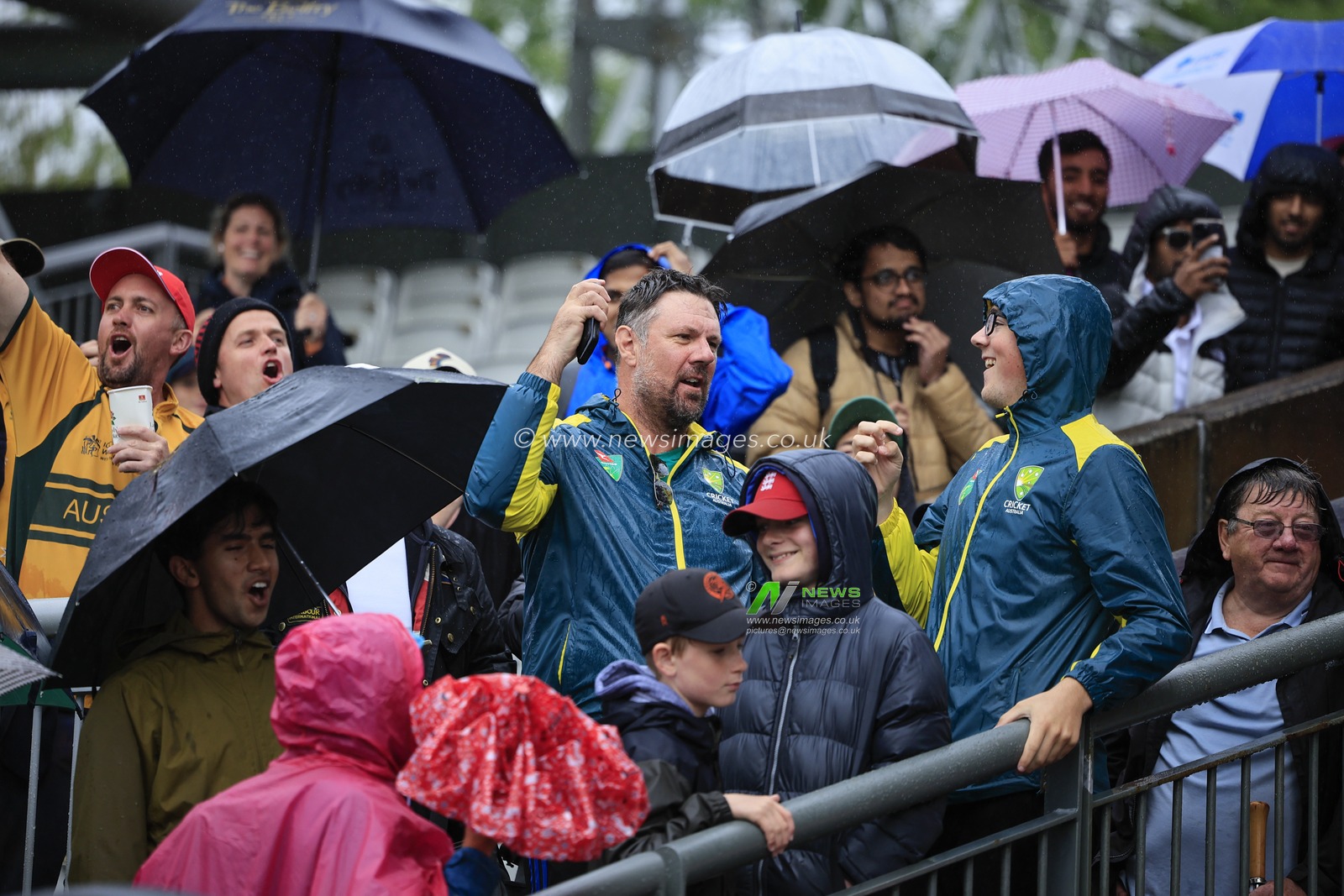 Australian fans celebrate the match being abandoned and Australia have won the Ashes after the LV= Insurance Ashes Test Series Fourth Test Day Five match England vs Australia at Old Trafford, Manchester, United Kingdom, 23rd July 2023

(Photo by Conor Molloy/News Images)