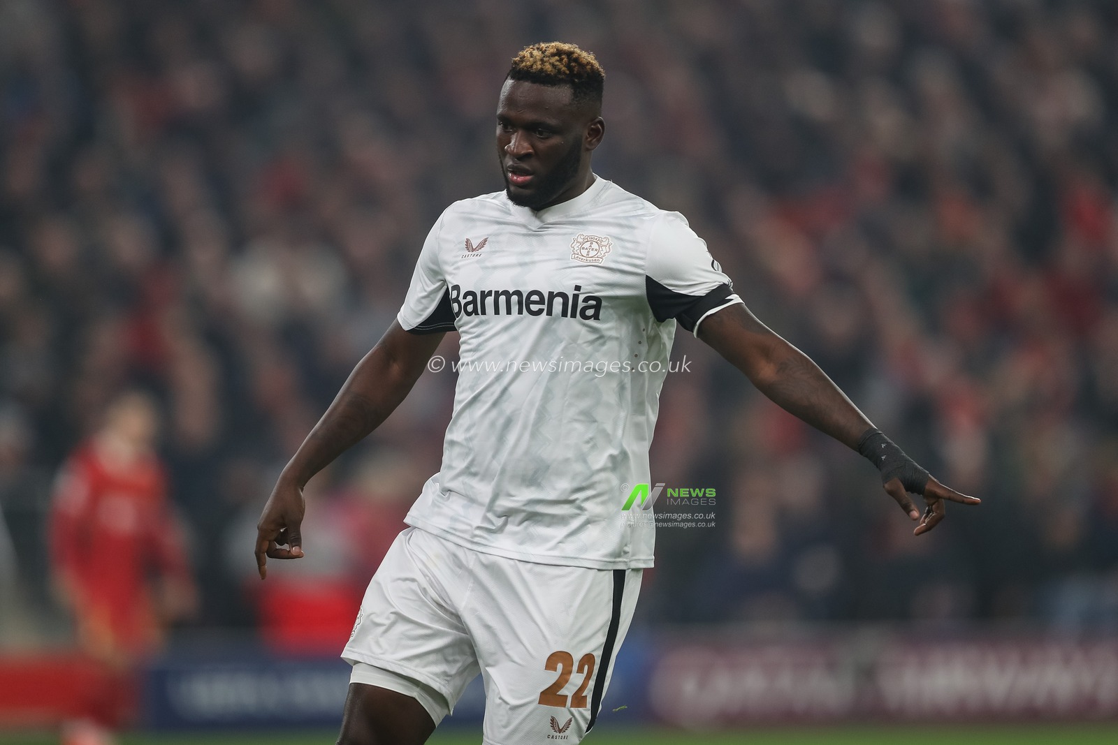 Victor Boniface of Bayer Leverkusen gives his team instructions during the UEFA Champions League, League Stage match Liverpool vs Bayer 04 Leverkusen at Anfield, Liverpool, United Kingdom, 5th November 2024

(Photo by Gareth Evans/News Images)