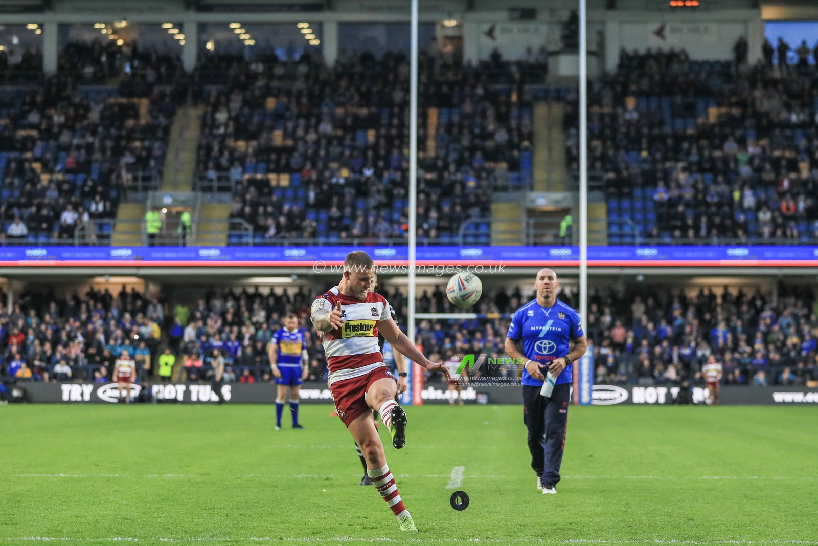 14th June 2019 , Emerald Headingley Stadium, England; Betfred Super League, Round 18, Leeds Rhinos vs Wigan Warriors ; Chris Hankinson (23) of Wigan Warriors converts 


Credit: Mark Cosgrove/News Images