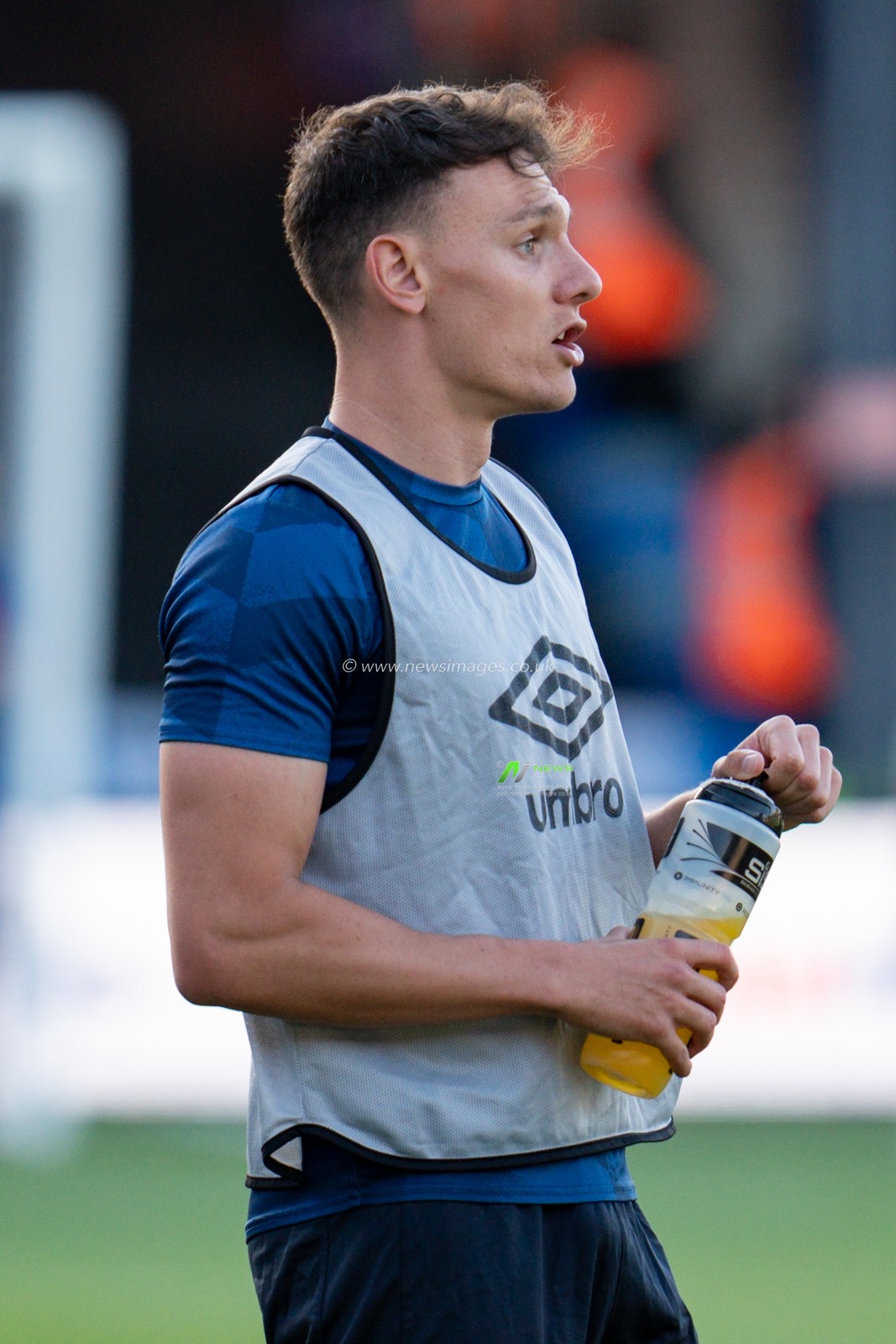 Kal Naismith #4 of Luton Town warming up