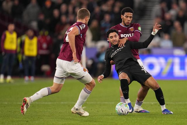 Jean-Clair Todibo of West Ham United and Omar Marmoush of Manchester City battle during the Premier League match West Ham United vs Manchester City at London Stadium, London, United Kingdom on 14 March 2026

(Photo by Harvey Murphy/News Images)