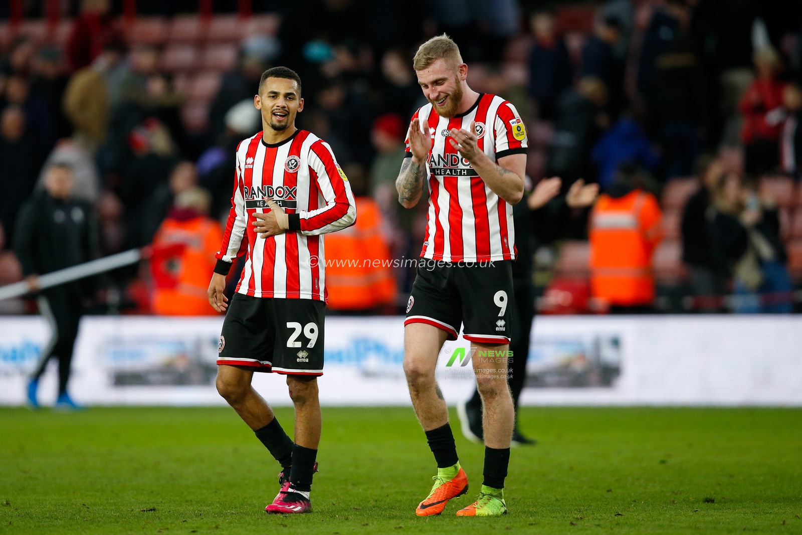 Iliman Ndiaye #29 of Sheffield United and Oliver McBurnie #9 of Sheffield United applauds fans after the Sky Bet Championship match Sheffield United vs Swansea City at Bramall Lane, Sheffield, United Kingdom, 11th February 2023

(Photo by Ben Early/News Images)