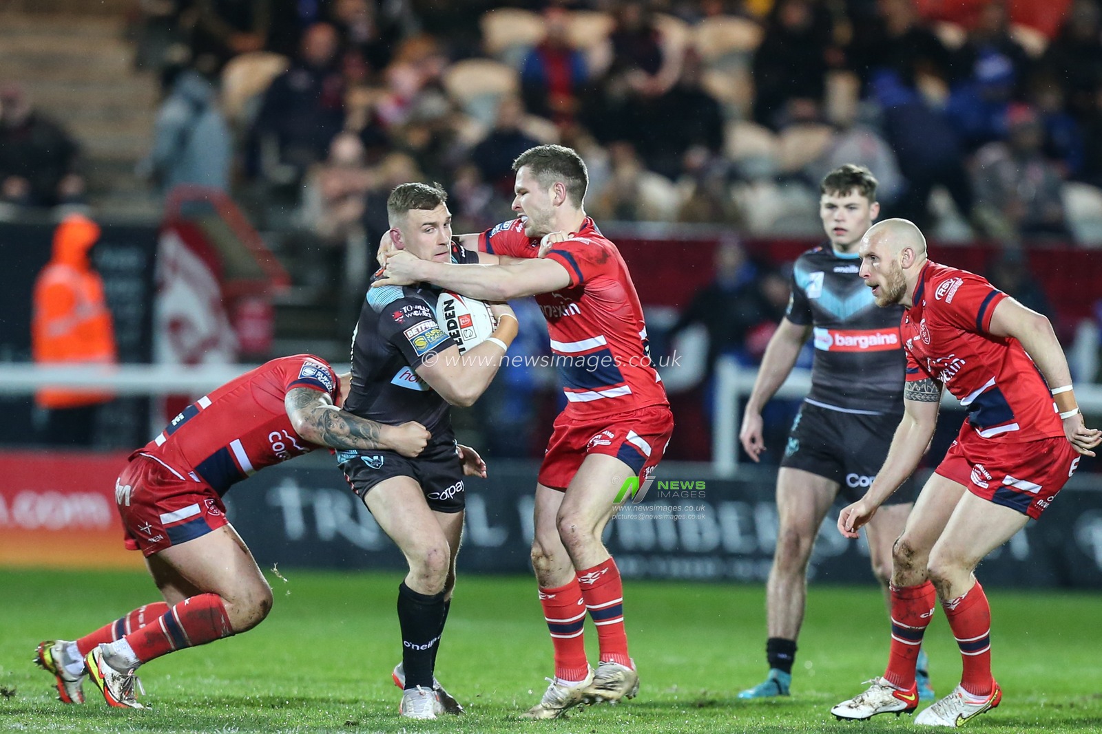 Matty Lees (10) of St Helens runs at the Hull KR defence
