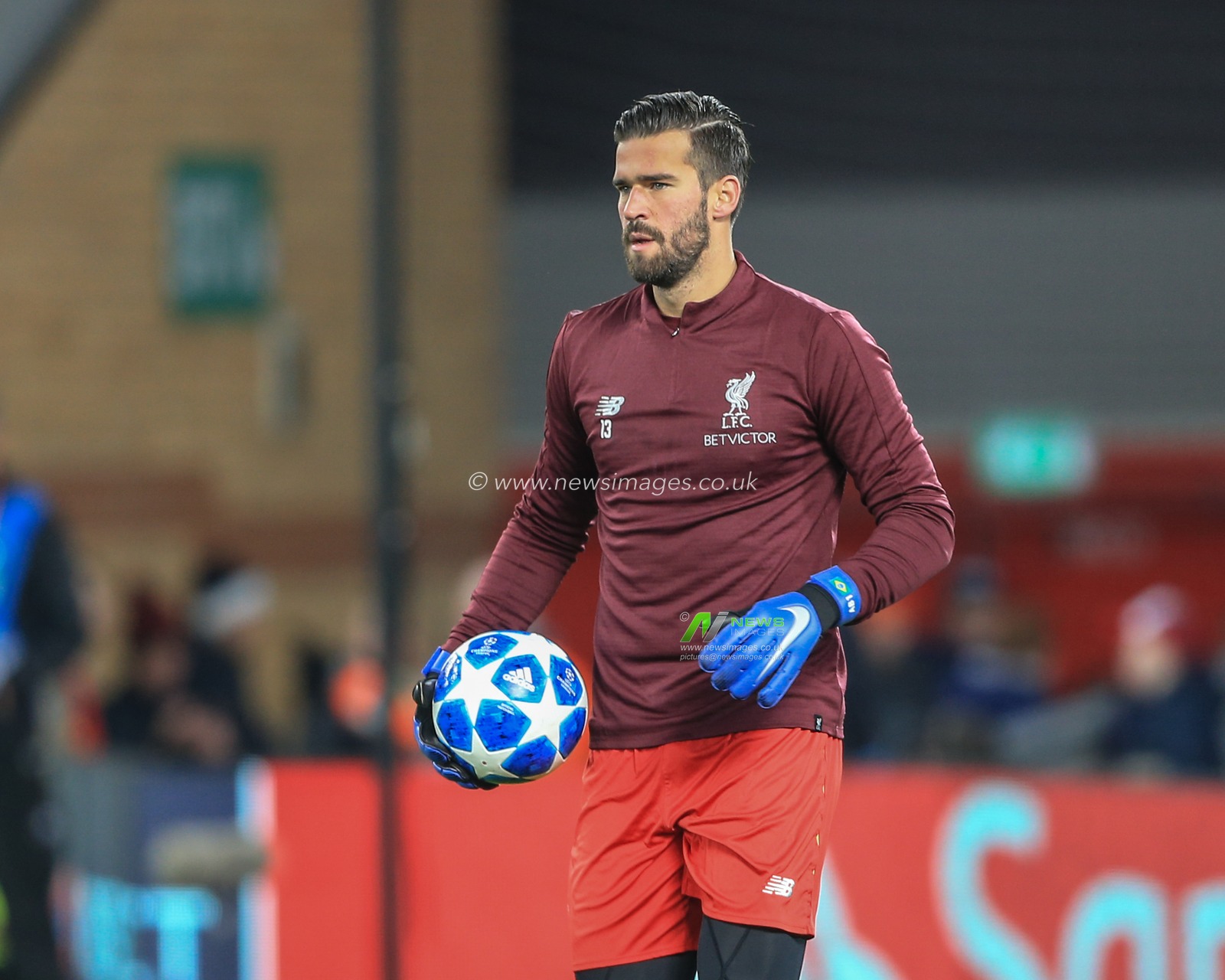 11th December 2018, Anfield, Liverpool, England; UEFA Champions League, Liverpool v Napoli ; Alisson Becker (13) of Liverpool warming up 


  Credit: Mark Cosgrove/News Images