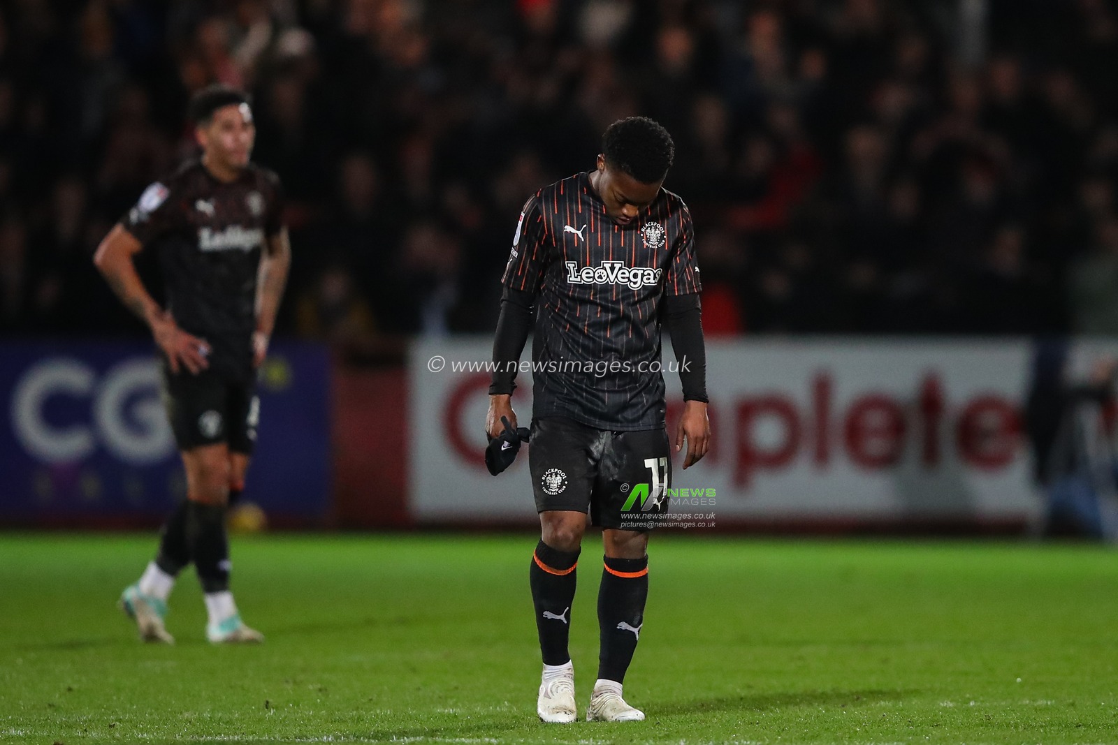 Karamoko Dembele of Blackpool reacts to his team's loss after the Sky Bet League 1 match Cheltenham Town vs Blackpool at The Completely-Suzuki Stadium, Cheltenham, United Kingdom, 13th February 2024

(Photo by Gareth Evans/News Images)