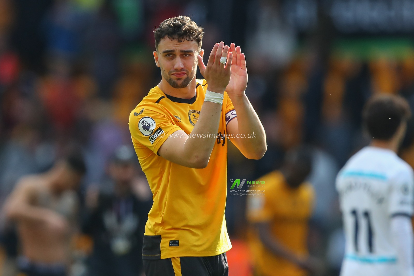 Max Kilman #23 of Wolverhampton Wanderers applauds the home fans after the Premier League match Wolverhampton Wanderers vs Chelsea at Molineux, Wolverhampton, United Kingdom, 8th April 2023

(Photo by Gareth Evans/News Images)