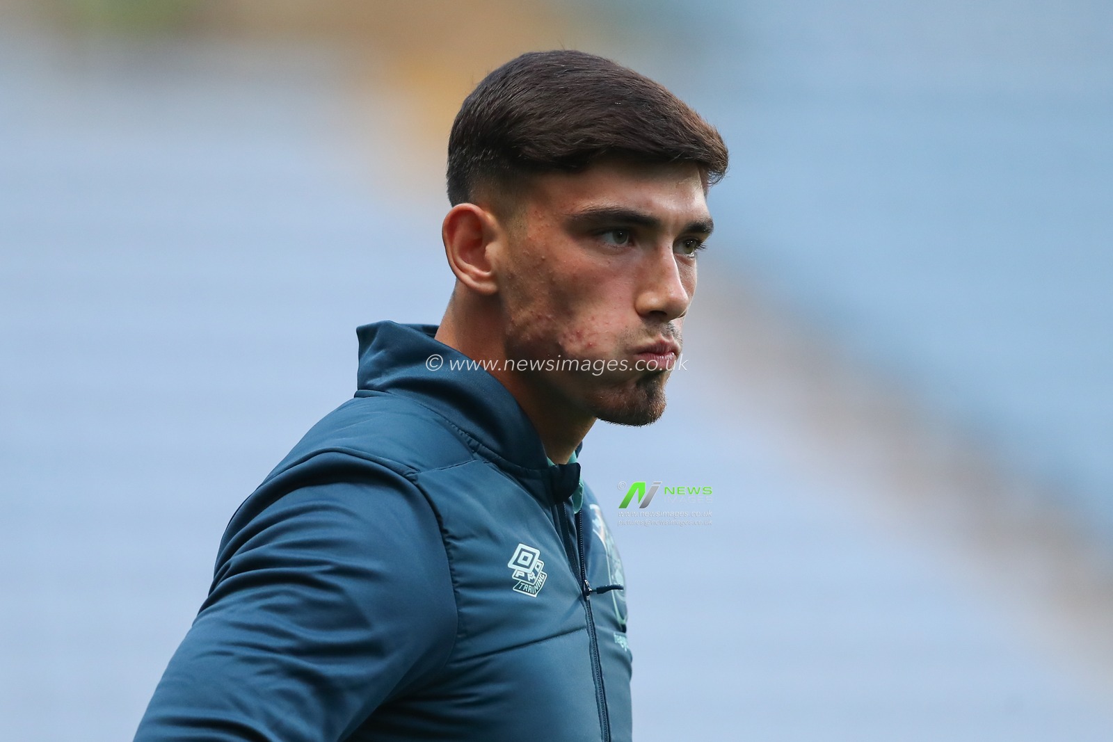 Kian Harratt #22 of Huddersfield Town arrives ahead of the Sky Bet Championship match Coventry City vs Huddersfield Town at Coventry Building Society Arena, Coventry, United Kingdom, 25th September 2023

(Photo by Gareth Evans/News Images)