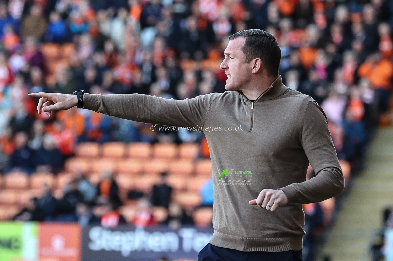 Neill Collins Head coach of Barnsley reacts in the technical area during the Sky Bet League 1 match Blackpool vs Barnsley at Bloomfield Road, Blackpool, United Kingdom, 20th April 2024

(Photo by Mark Cosgrove/News Images)